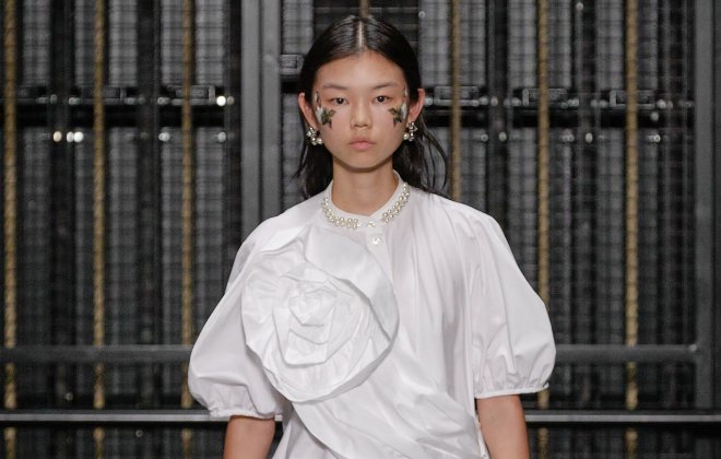 A model in a white dress.