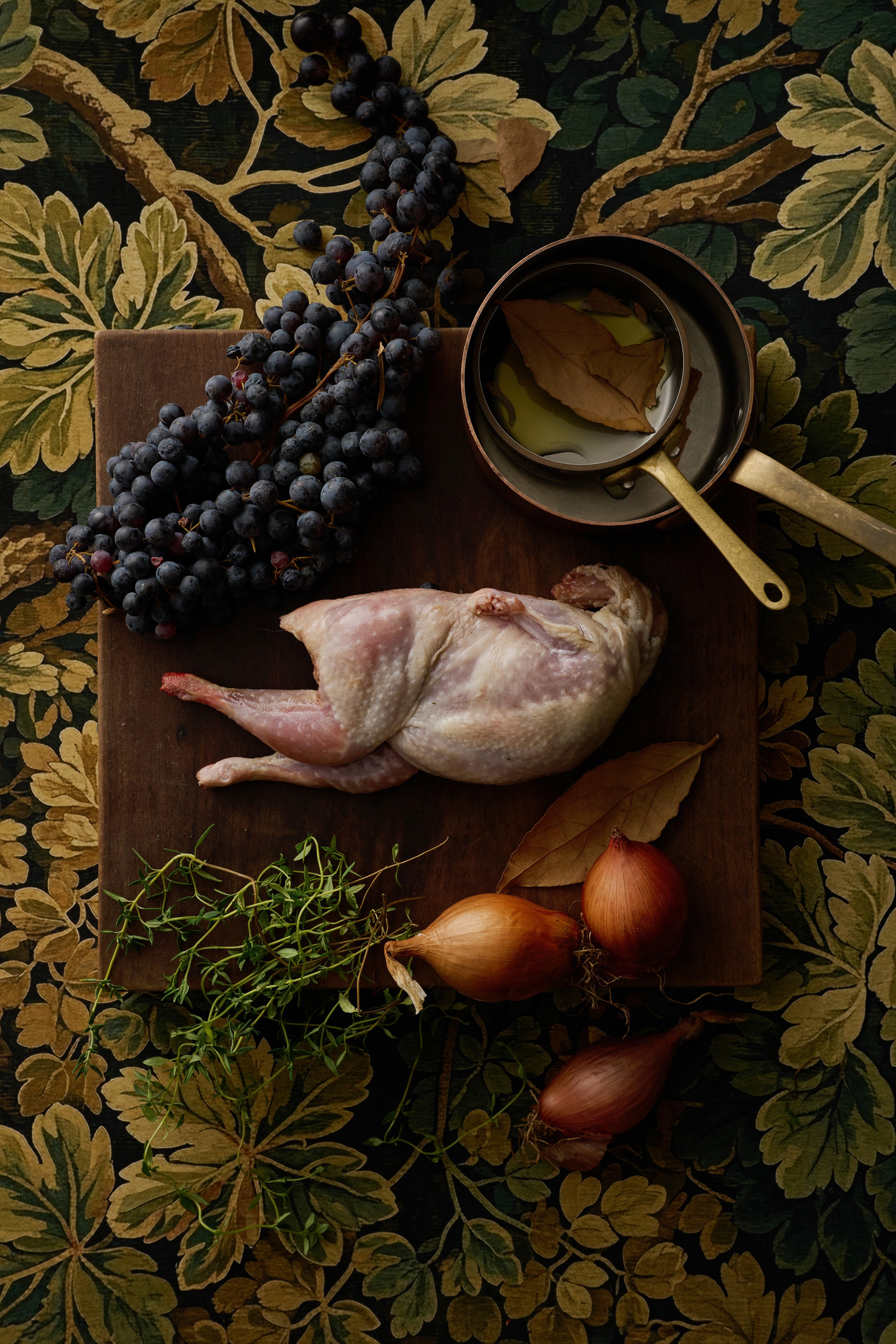Raw quail and grapes.