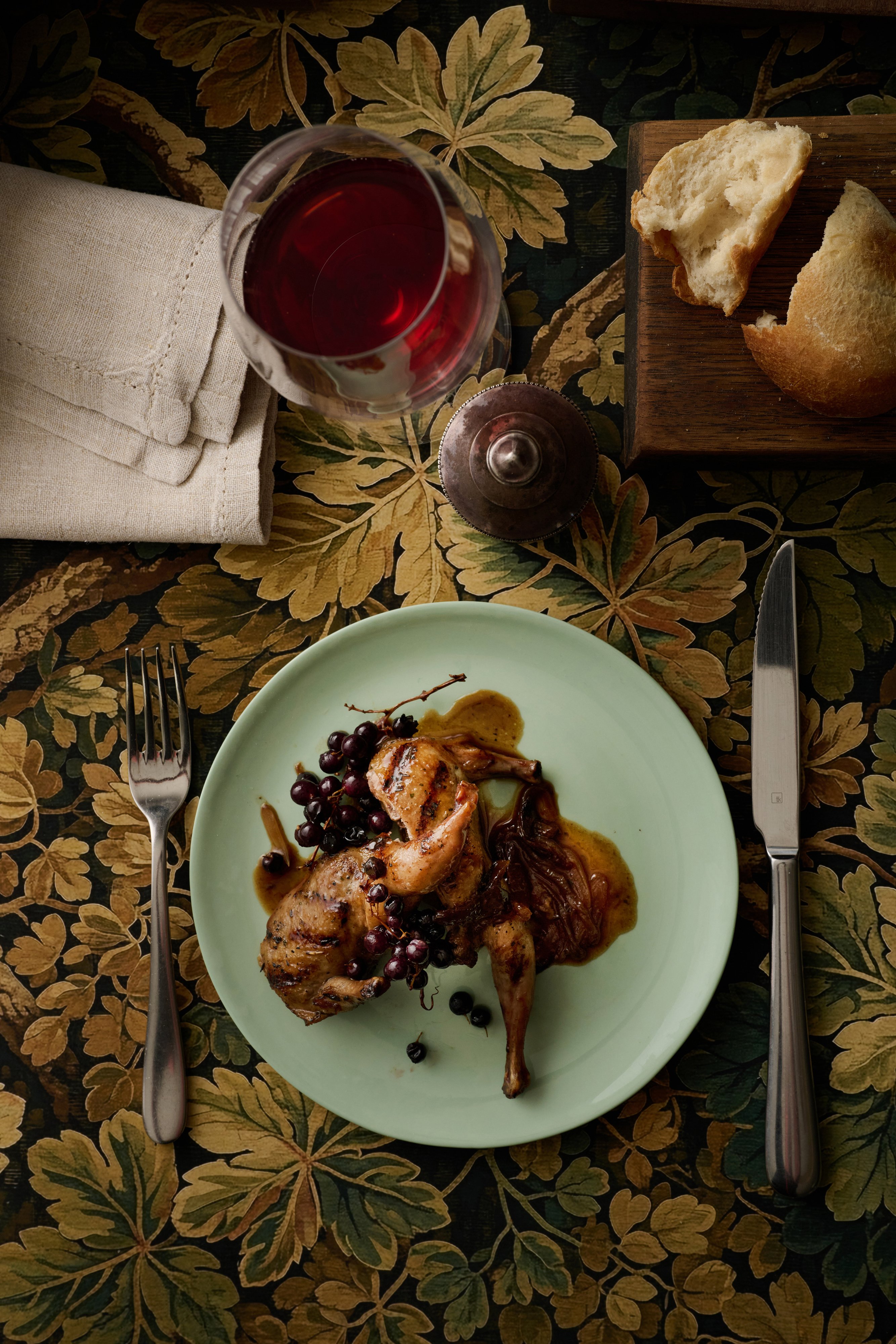 Quail with grapes.