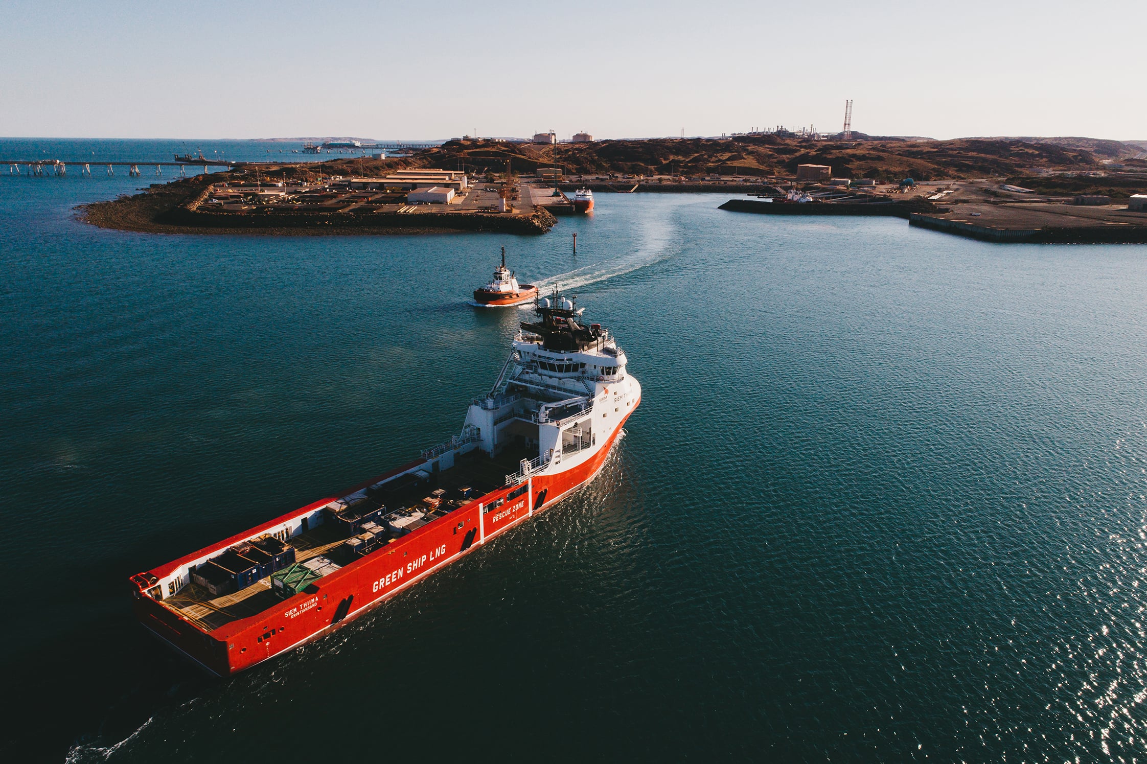 A cargo ship outside port.
