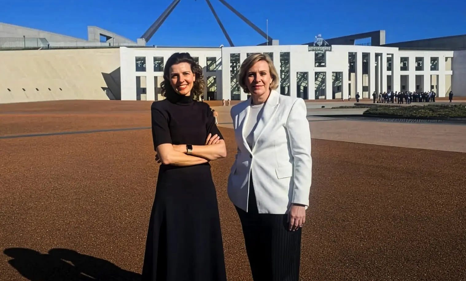Member for Wentworth Allegra Spender and Member for Warringah Zali Steggall outside Parliament House, Canberra.