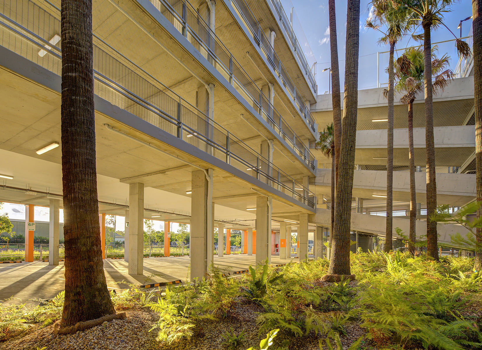 View of multistorey car park with adjoining garden.