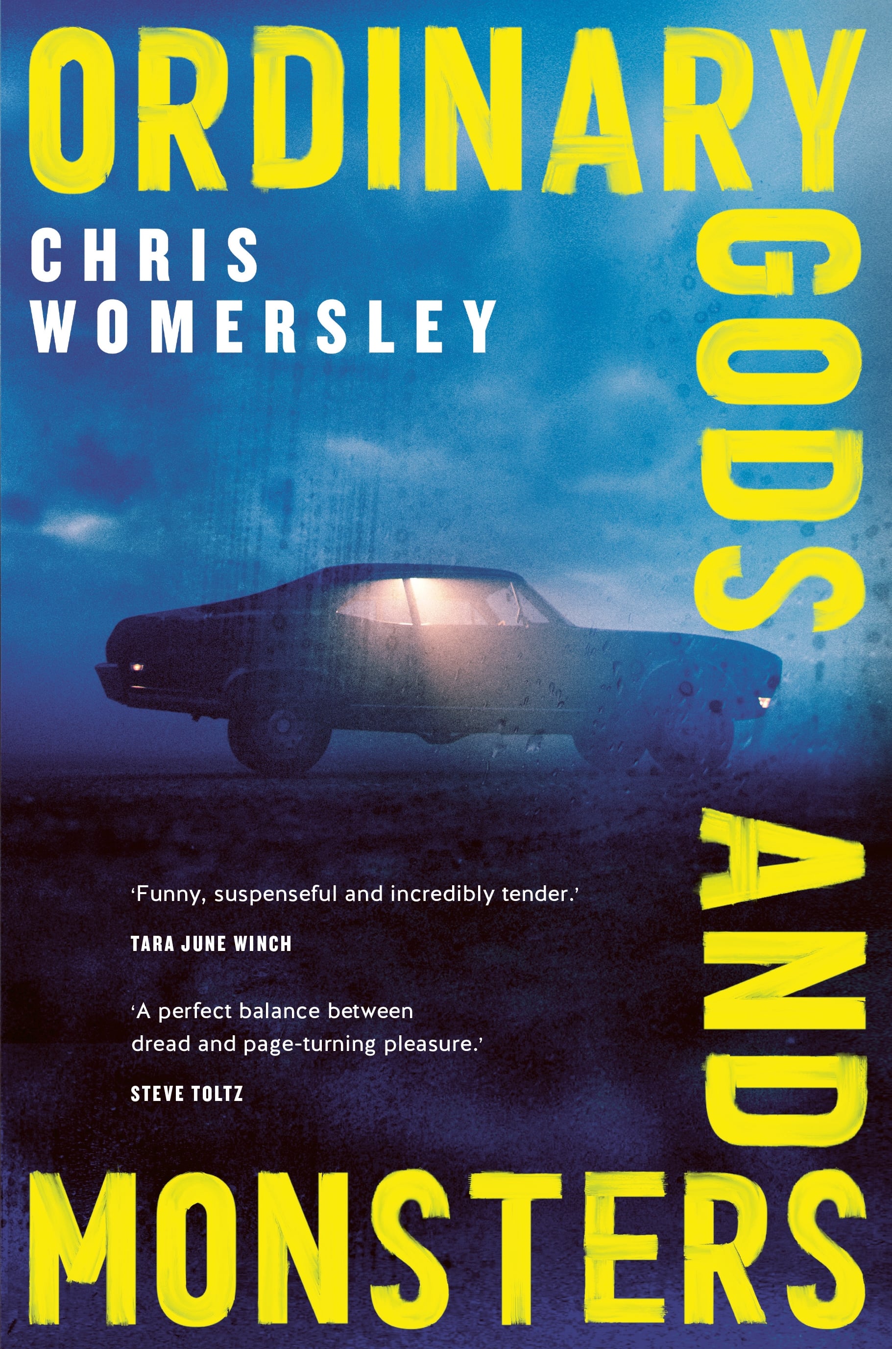 Book cover: A car with it’s lights on under dark clouds.