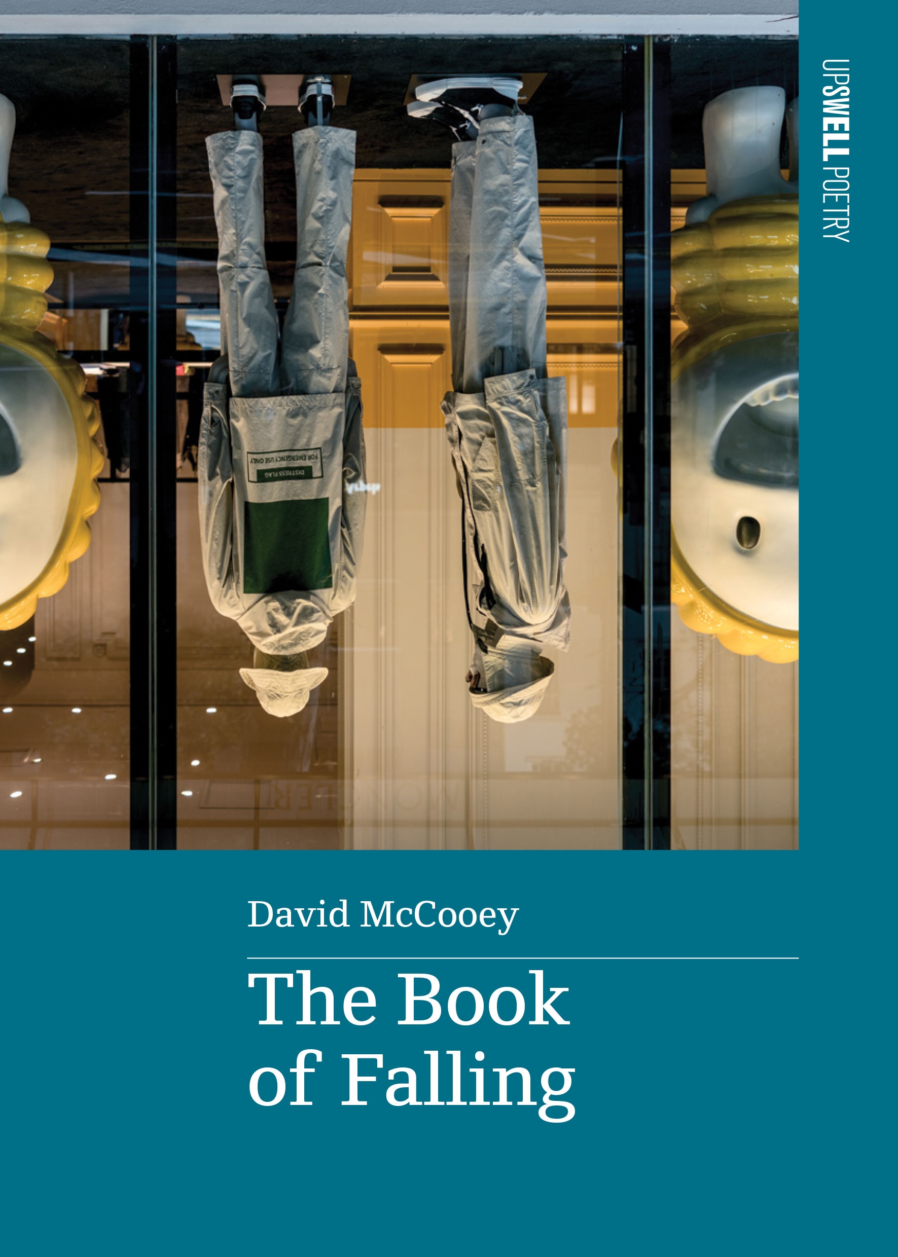 Book cover: White text across a blue background in the bottom third of the cover, indicating the book title and author name. Above, a photo of two mannequins dressed in casual streetwear behind a shop window.
