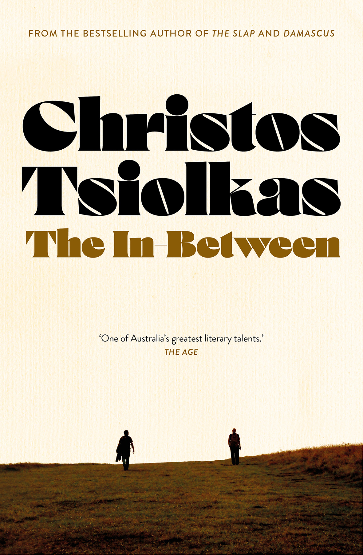 Book cover: two figures in the distance walking up a hill.