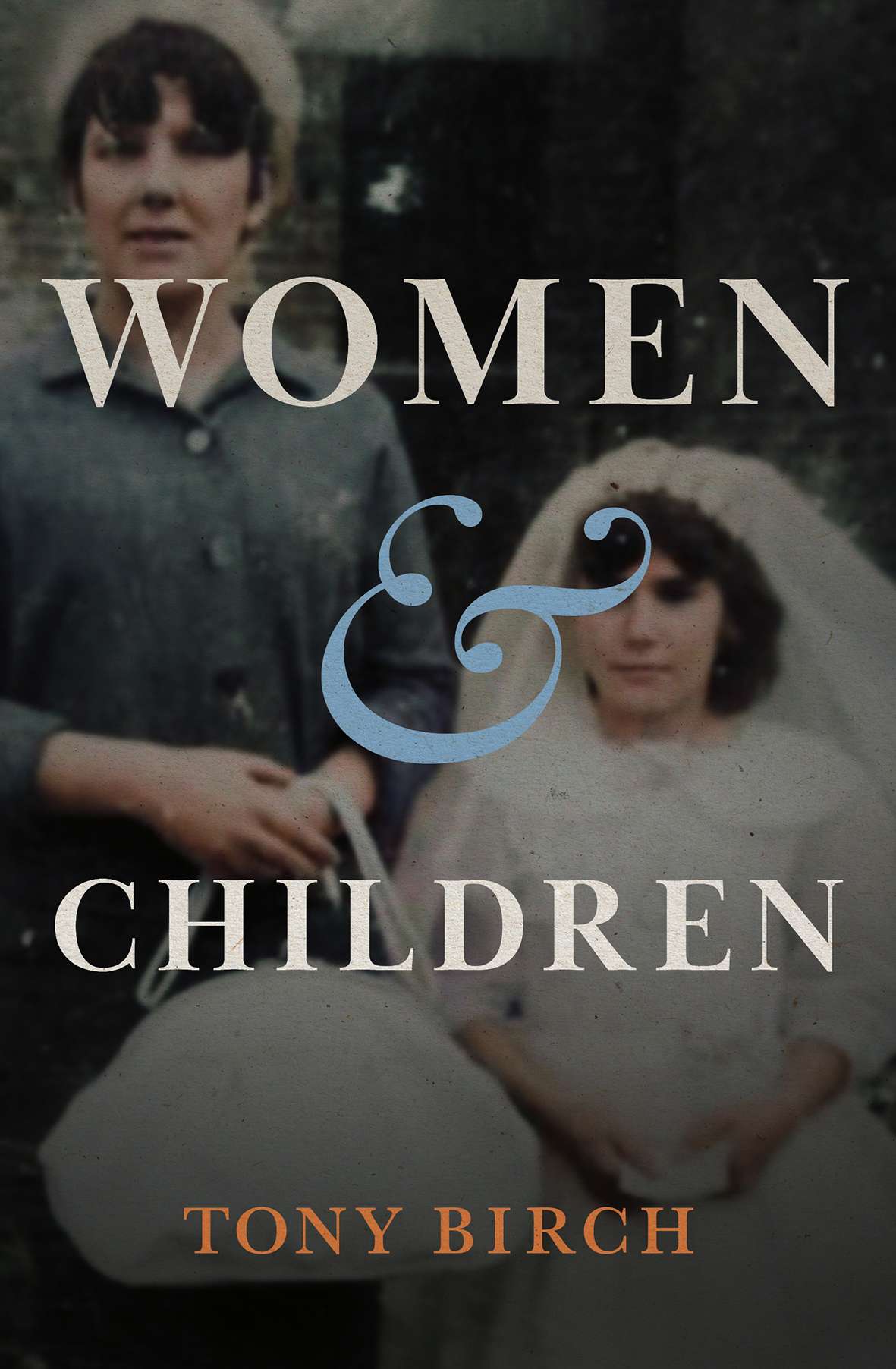 Photograph of a woman beside a child dressed in a wedding dress.