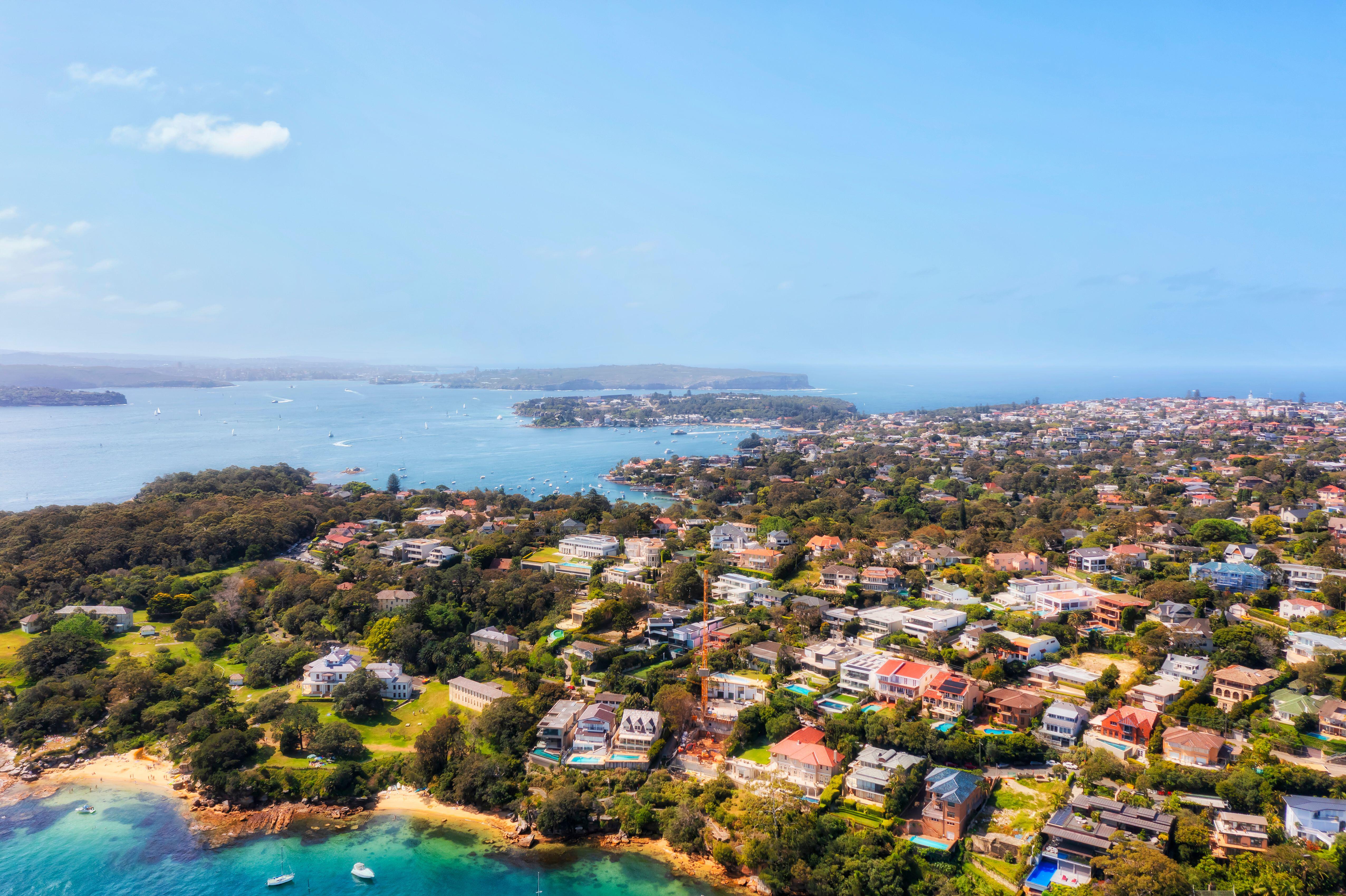 An aerial view of a harbourside suburb in Sydney.