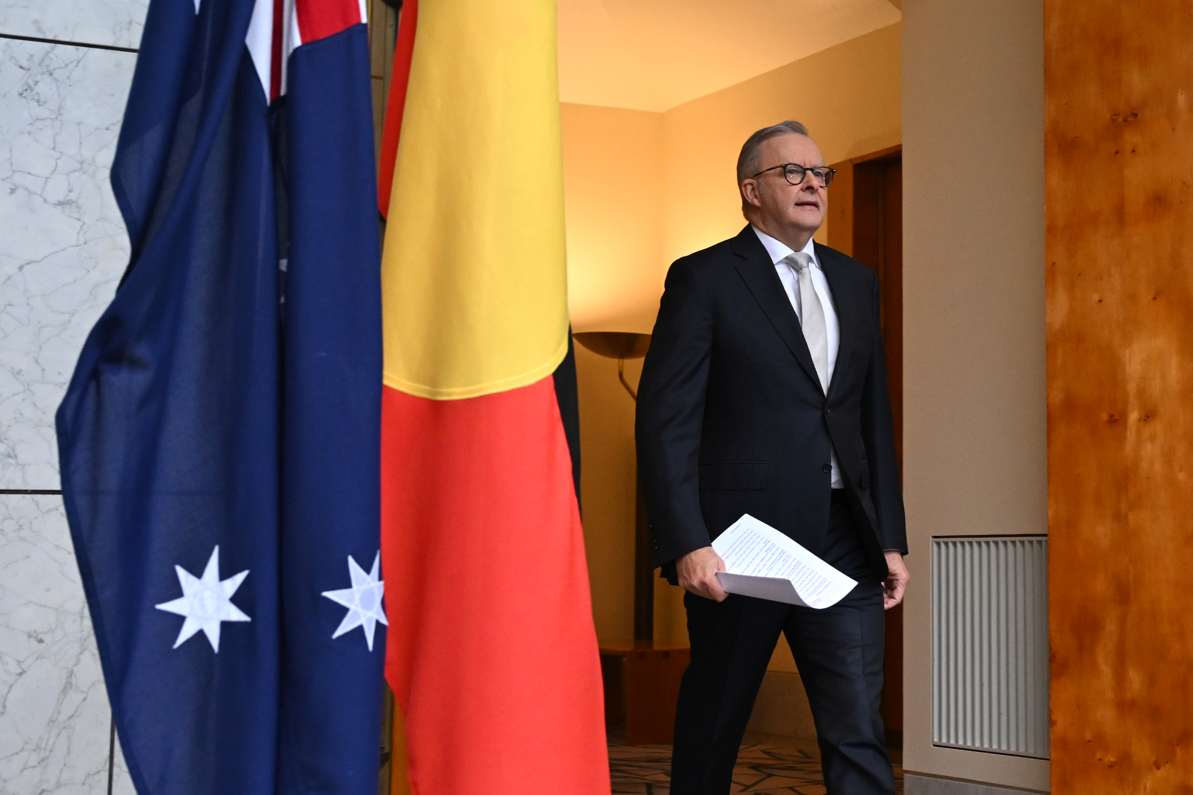 Prime Minister Anthony Albanese arrives to speak to the media at Parliament House on Friday.