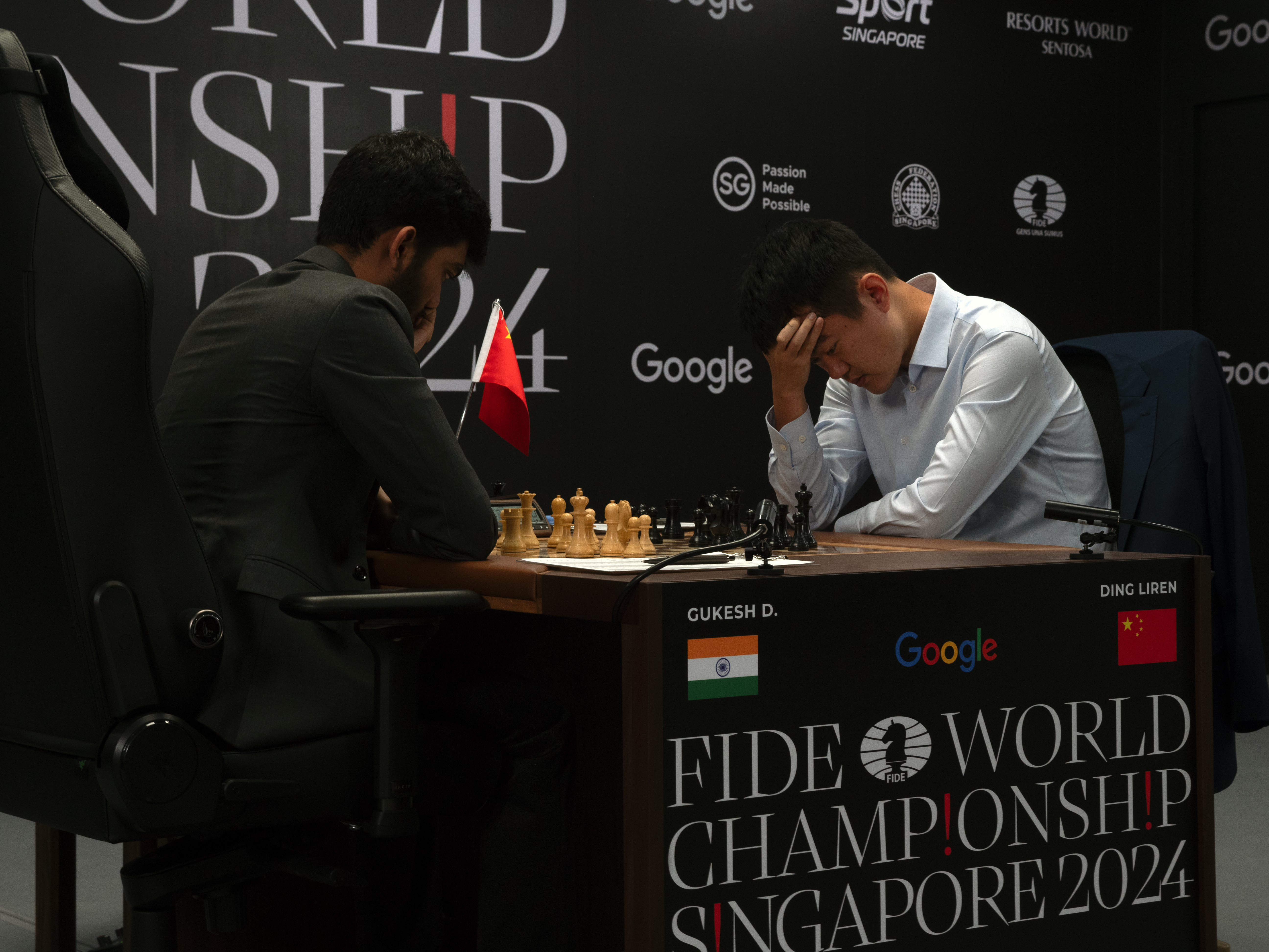 Two people playing chess.