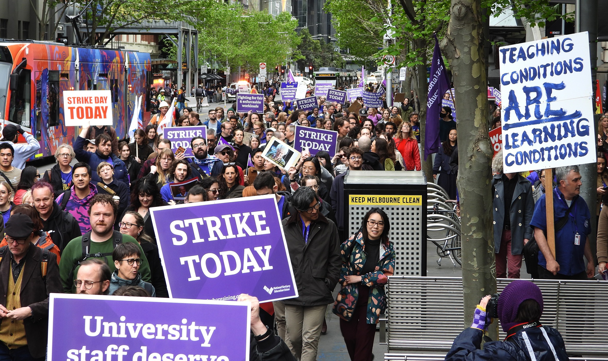 Protesters march through the Melbourne CBD.