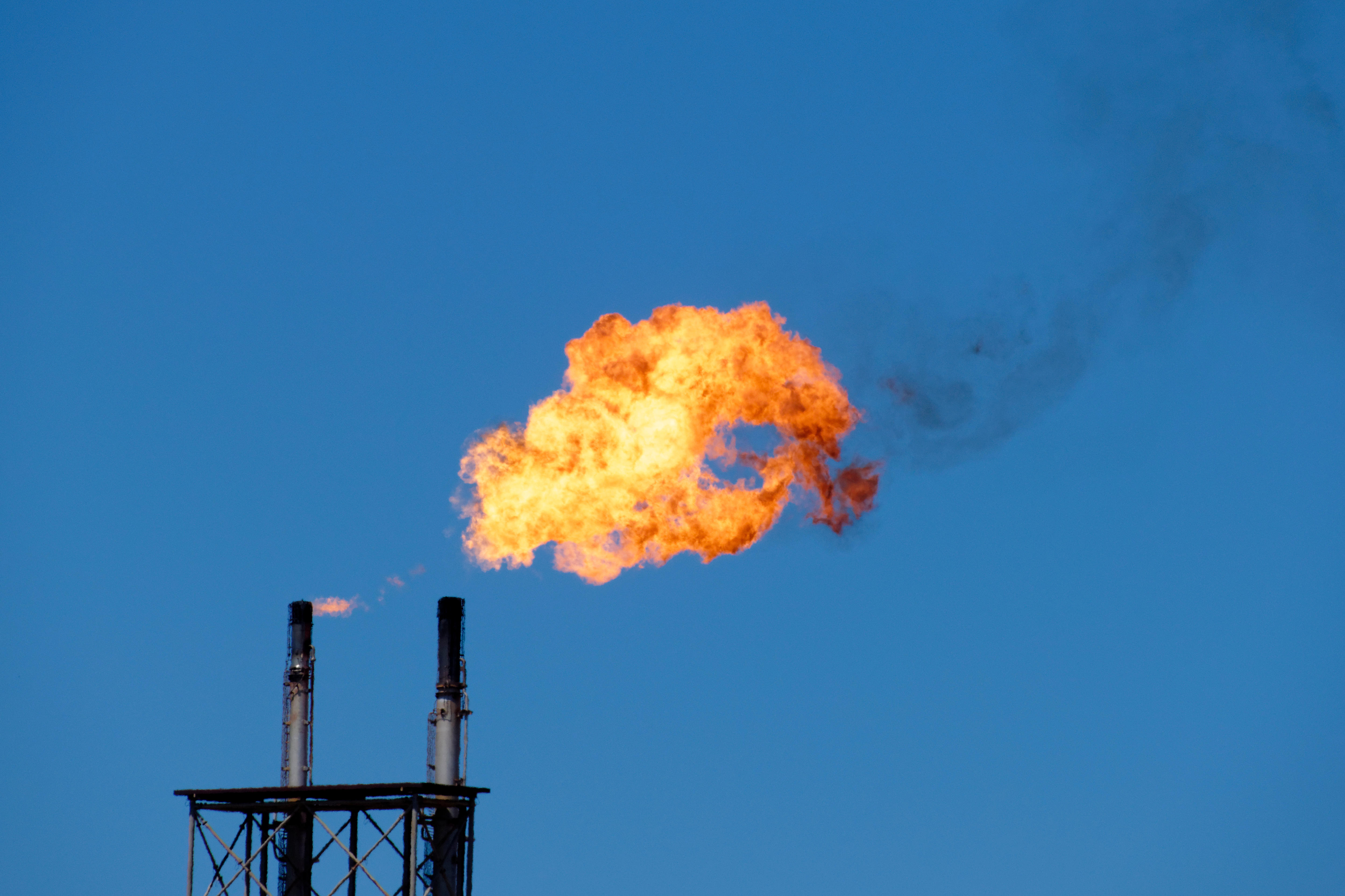 A gas flame in the blue sky.