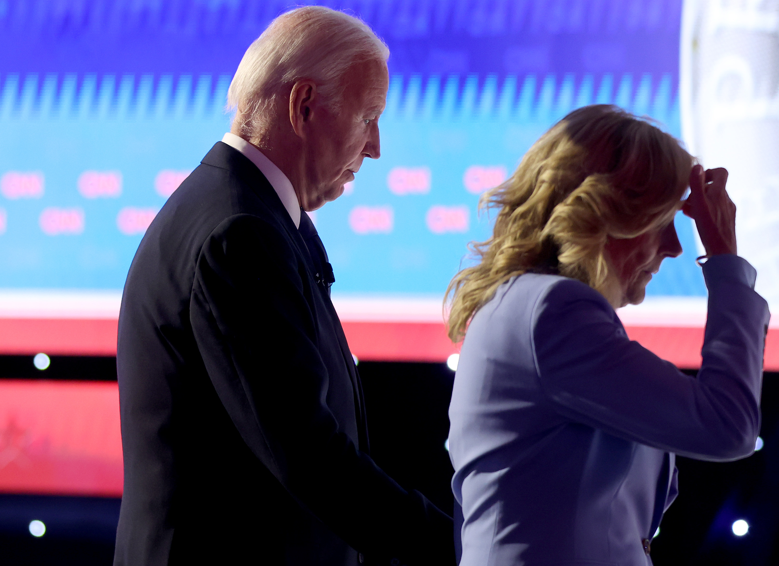 U.S. President Joe Biden walks off with first lady Jill Biden following the CNN Presidential Debate at the CNN Studios on June 27, 2024 in Atlanta, Georgia.
