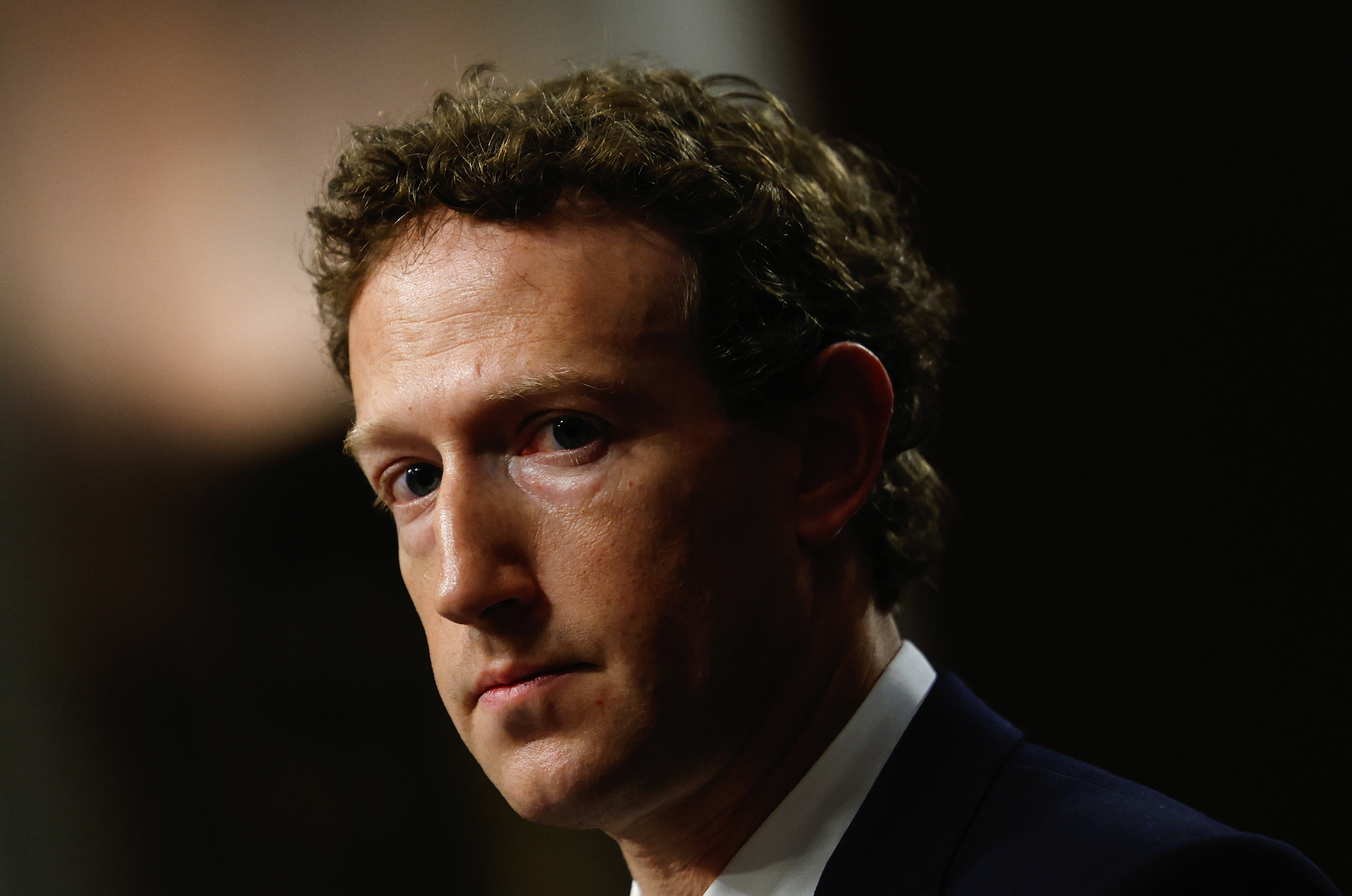 Mark Zuckerberg in a suit. 