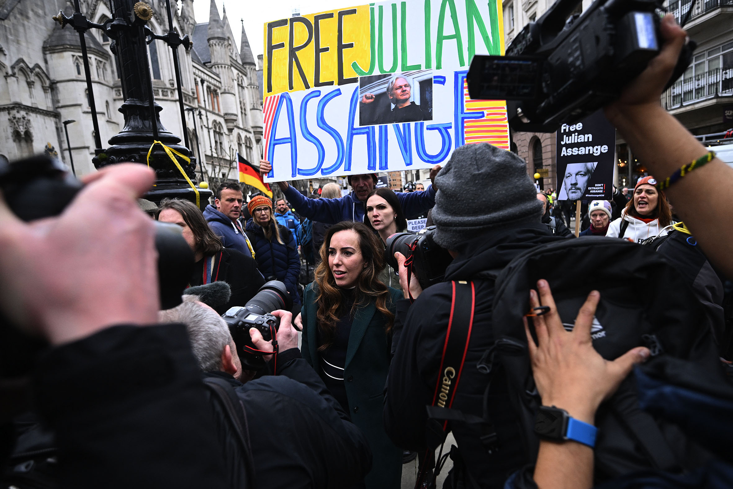 Protestors with Free Julian Assange 