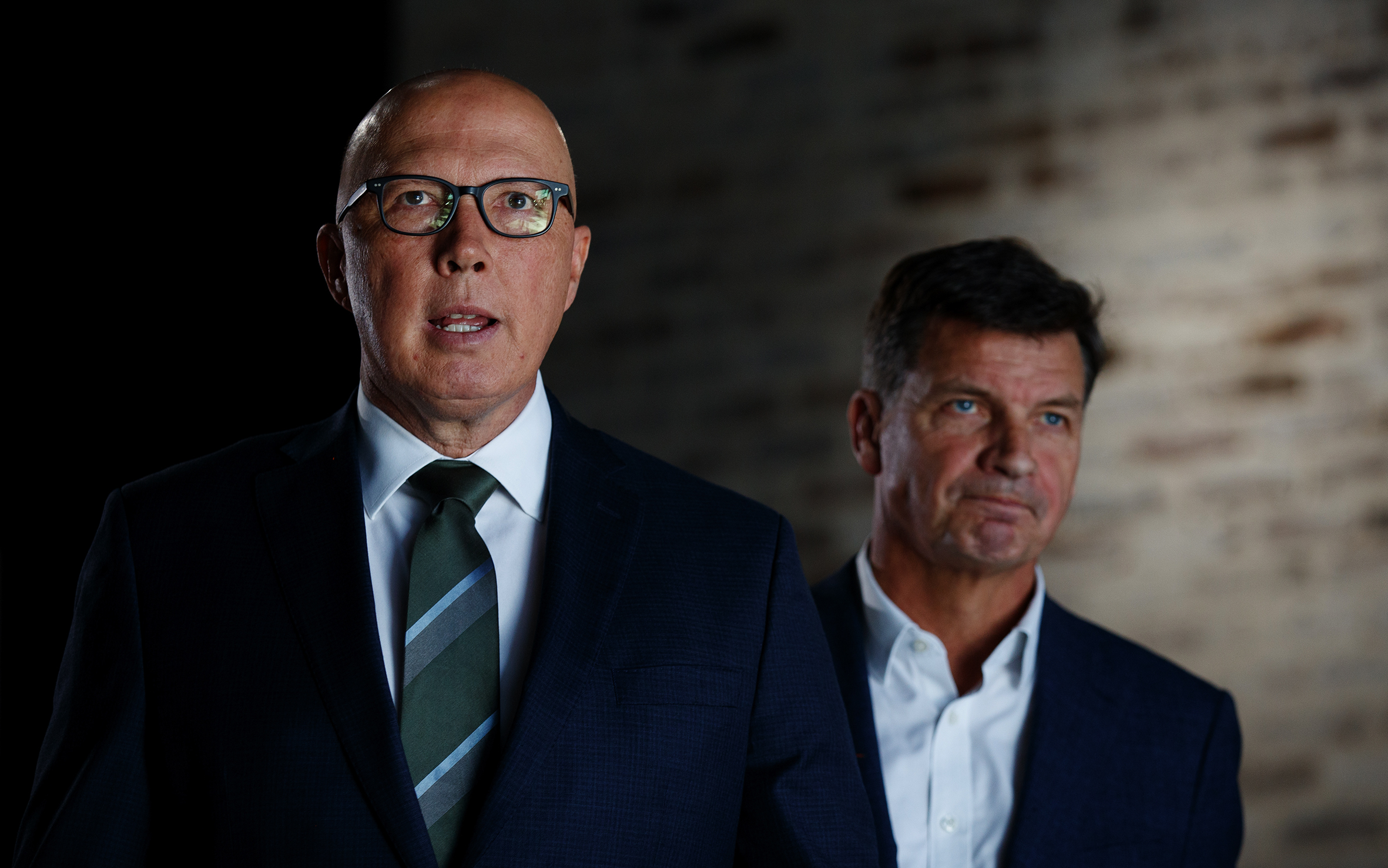 Leader of the Opposition Peter Dutton and Shadow Treasurer Angus Taylor dressed in suits.