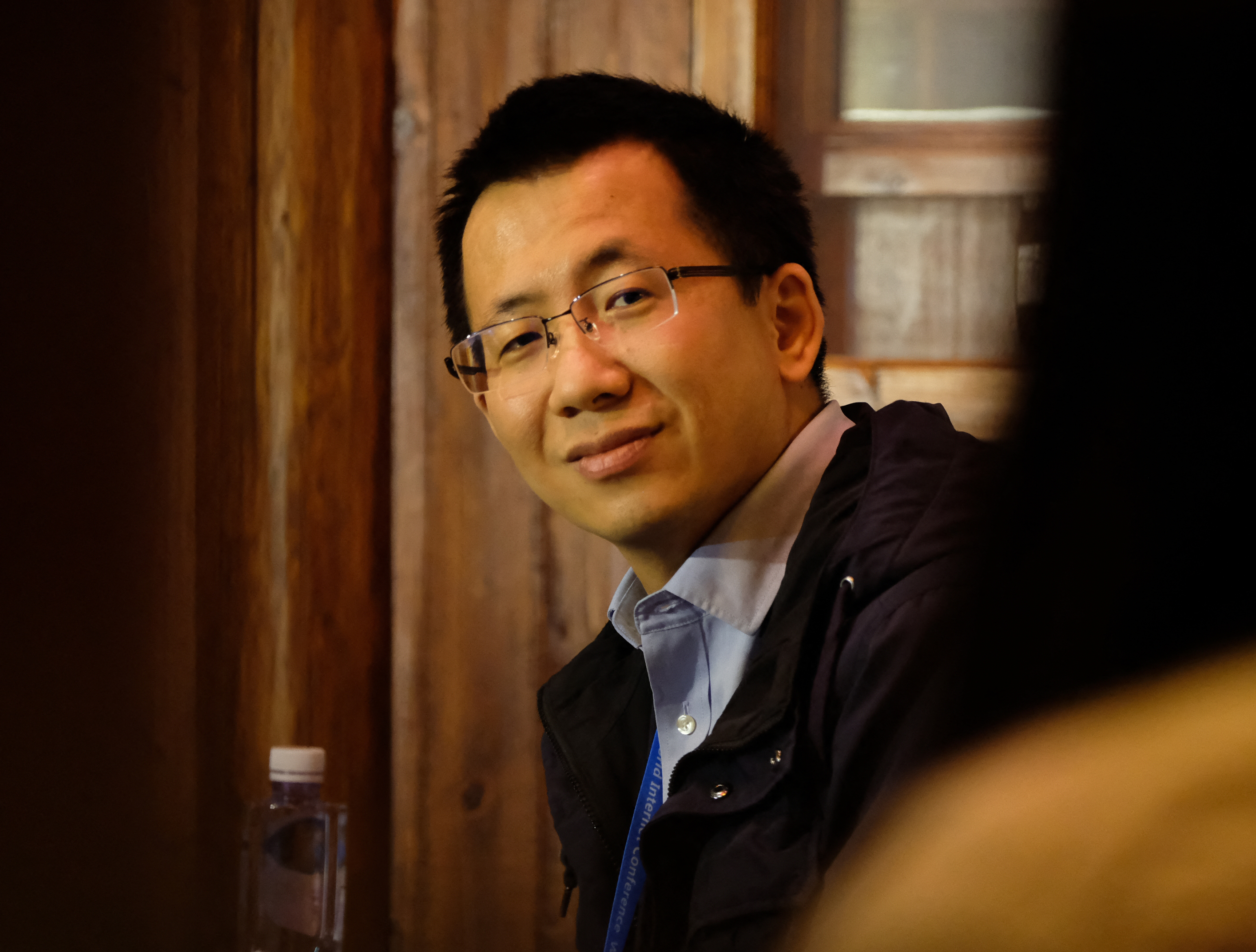 Zhang Yiming gazing toward the camera.