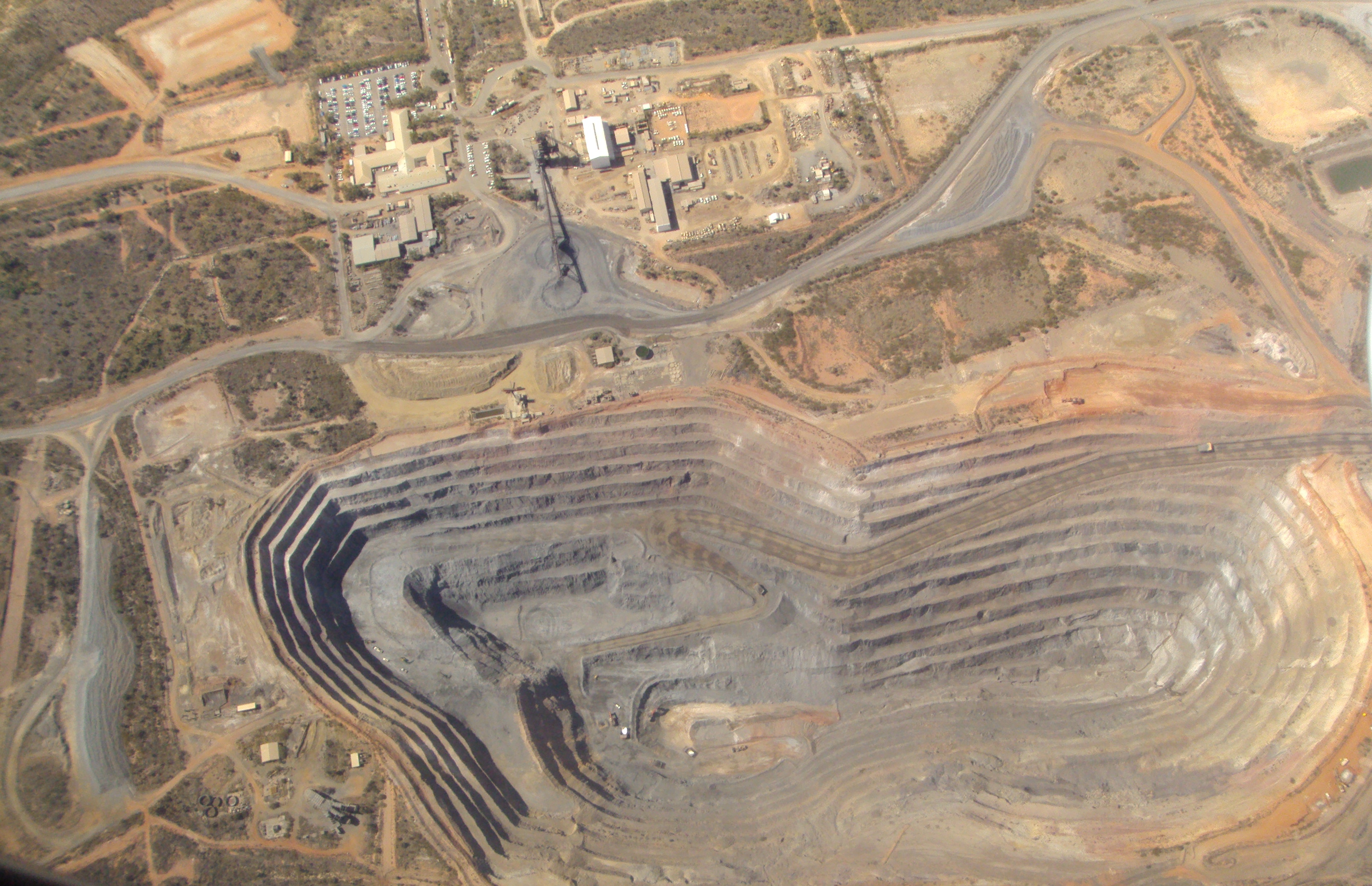 Who foots the bill for open-cut mine rehabilitation?