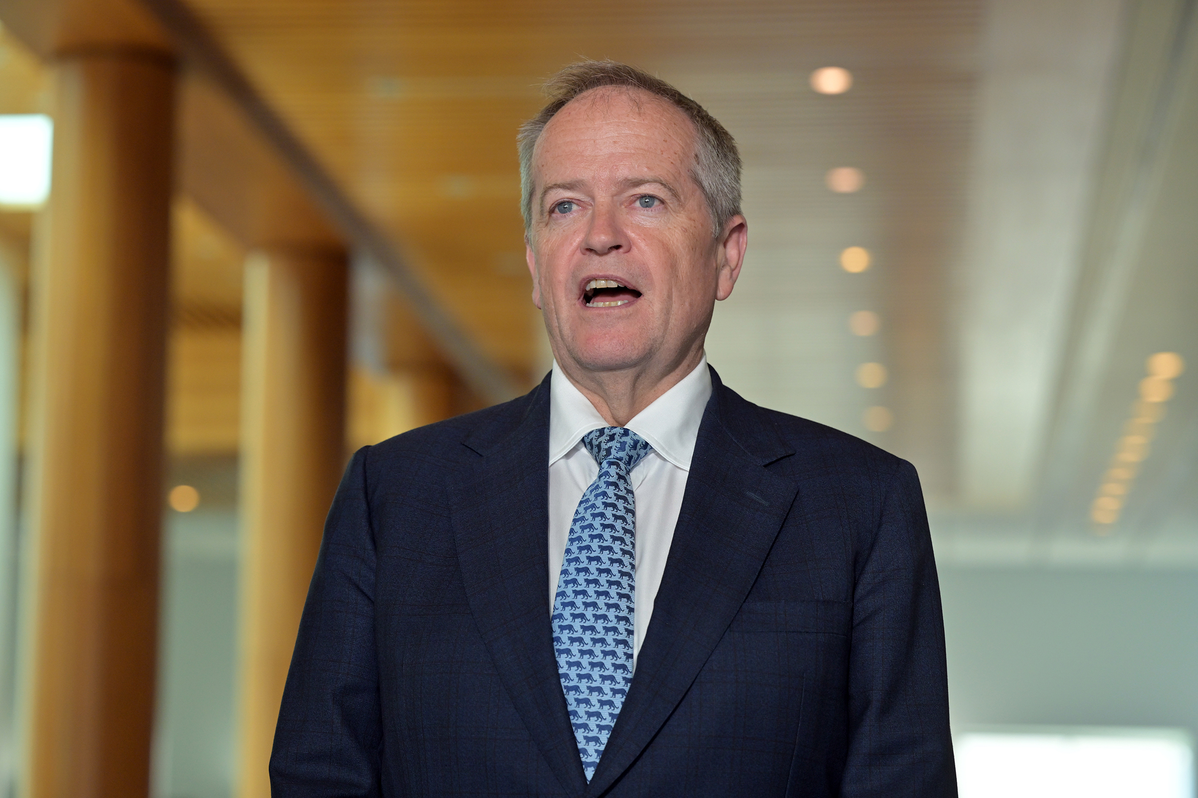 Bill Shorten in a suit and a blue tie.