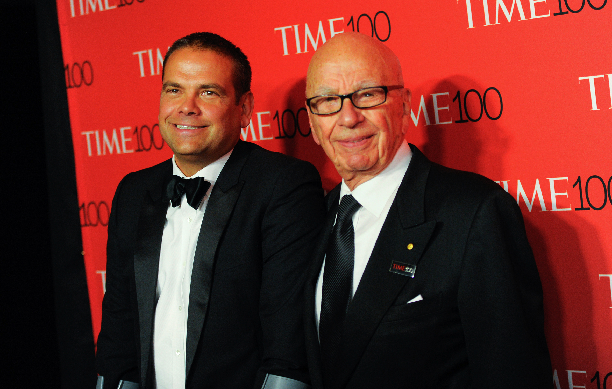 Lachlan and Rupert Murdoch in tuxedos.