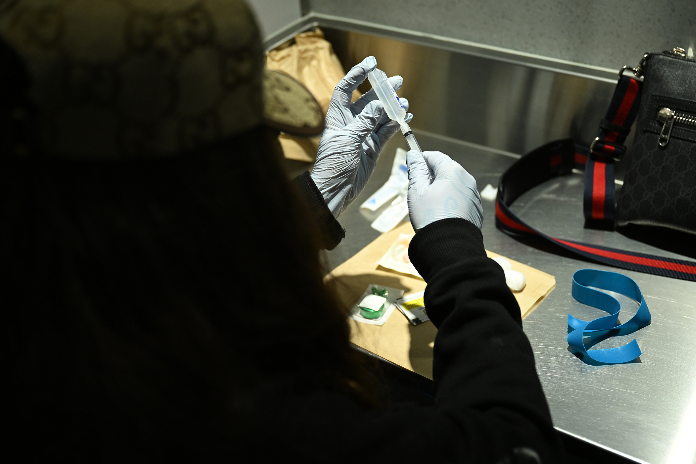 A person prepares a syringe at North Richmond’s medically supervised injecting room. 