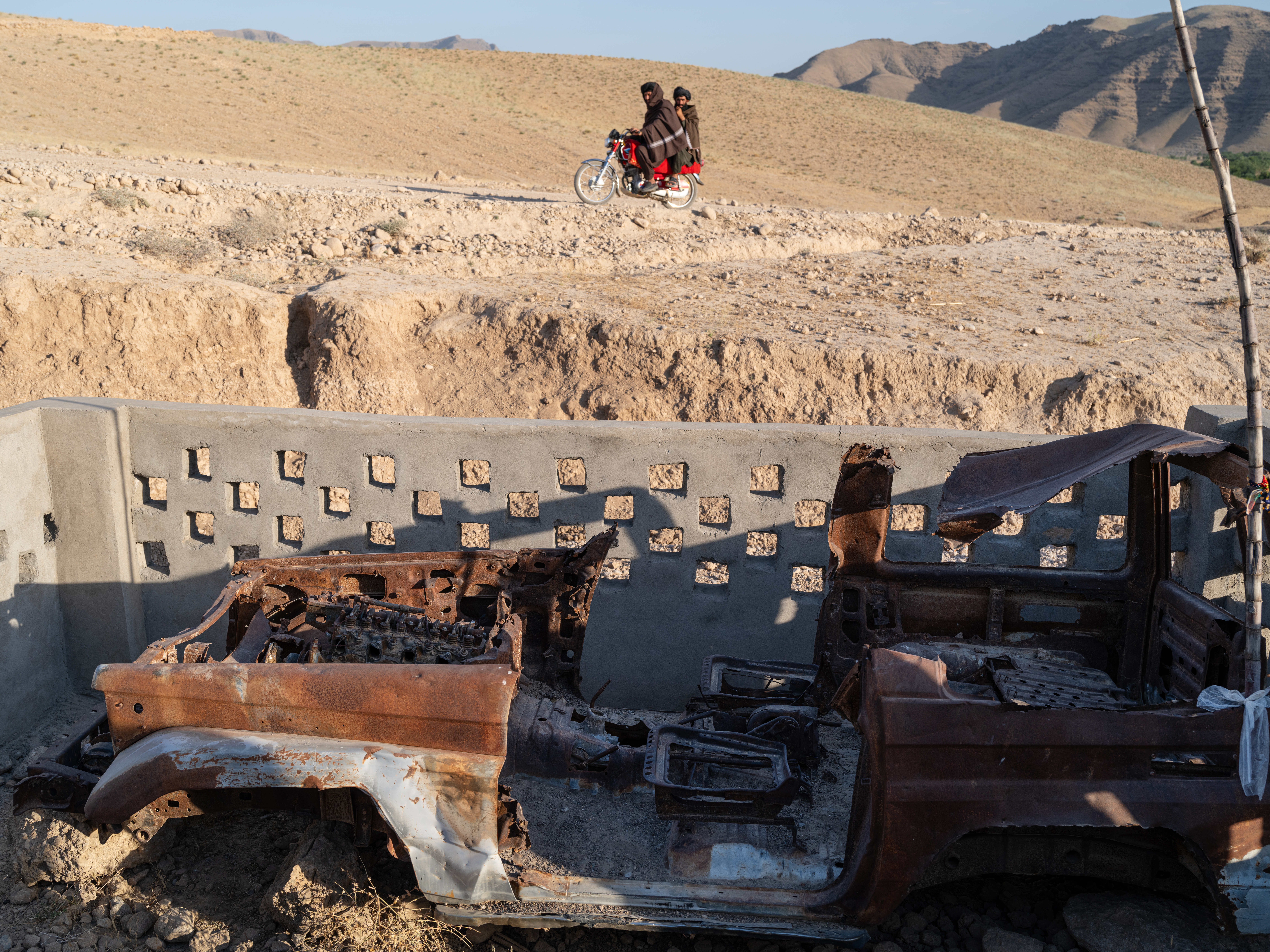The burnt-out car in which five Afghans were allegedly killed by foreign soldiers in Shahmashad.