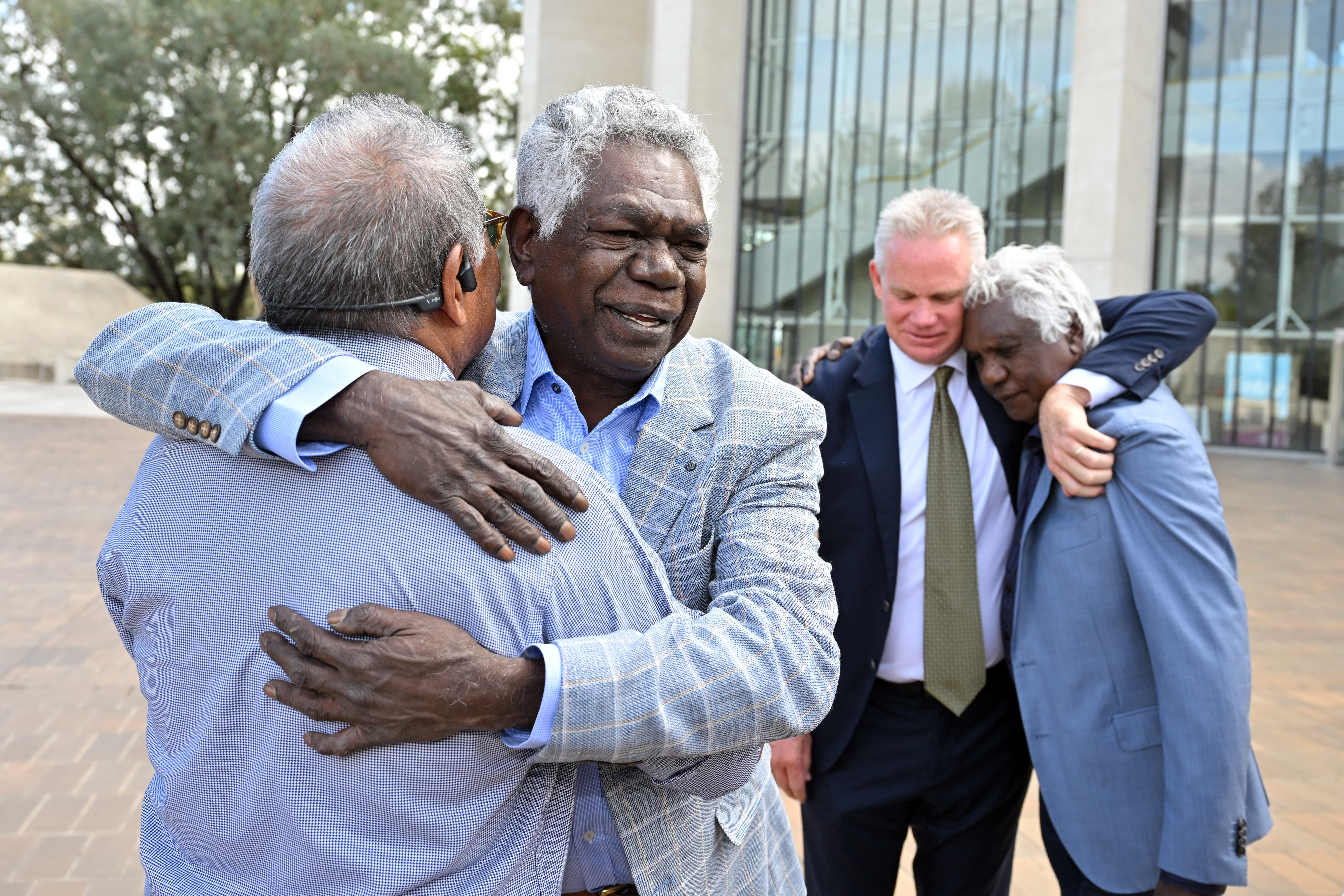 Gumatj leaders Djawa and Balupalu Yunupingu celebrate at the High Court this month.