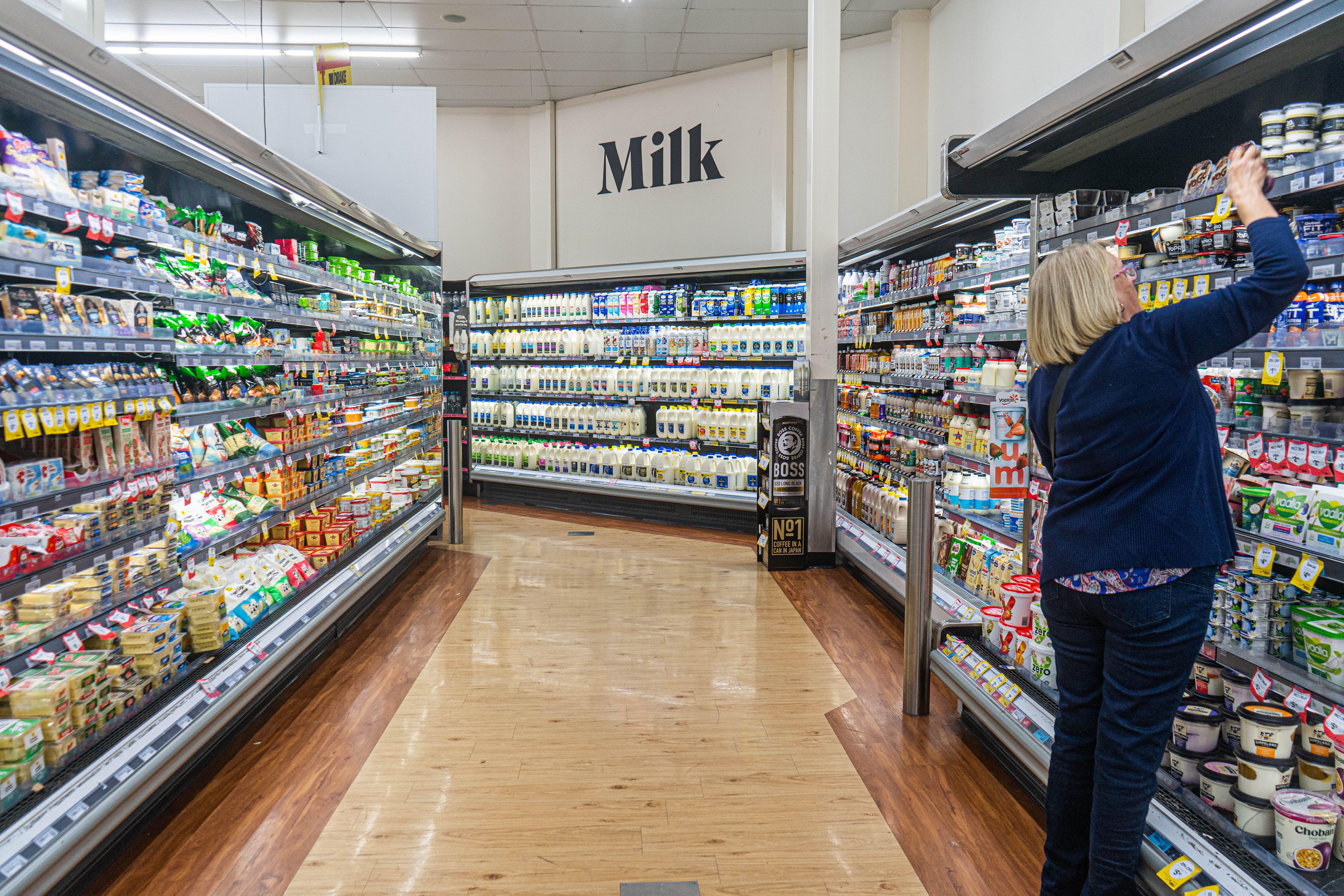 The dairy aisle of a supermarket.