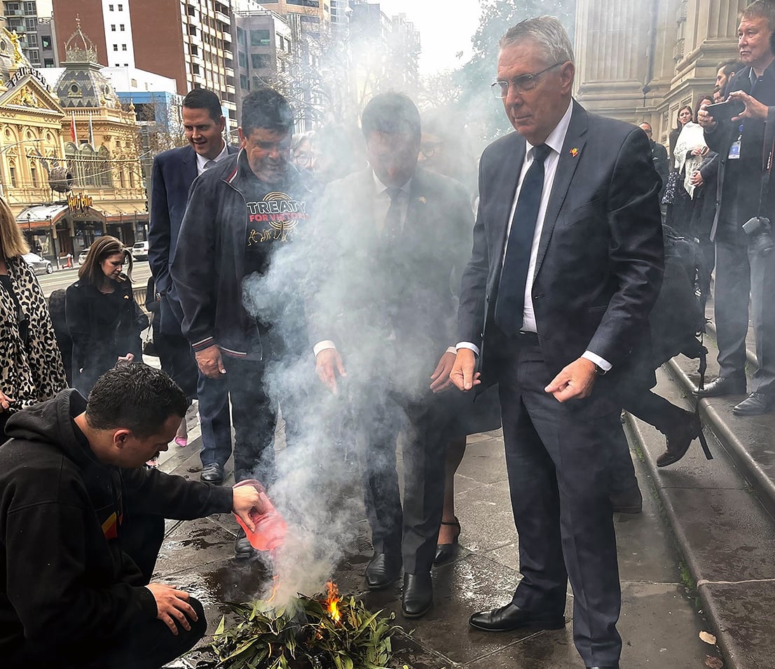 A smoking ceremony outside state parliament. 