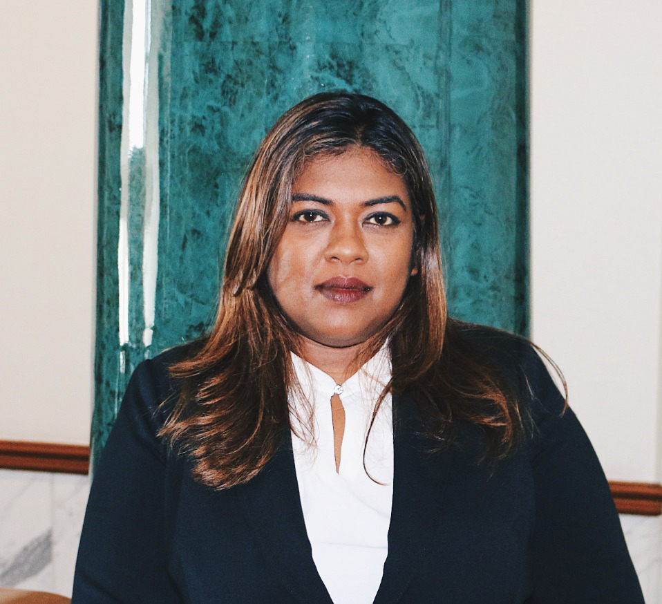 Portrait image of a woman in formal dress.