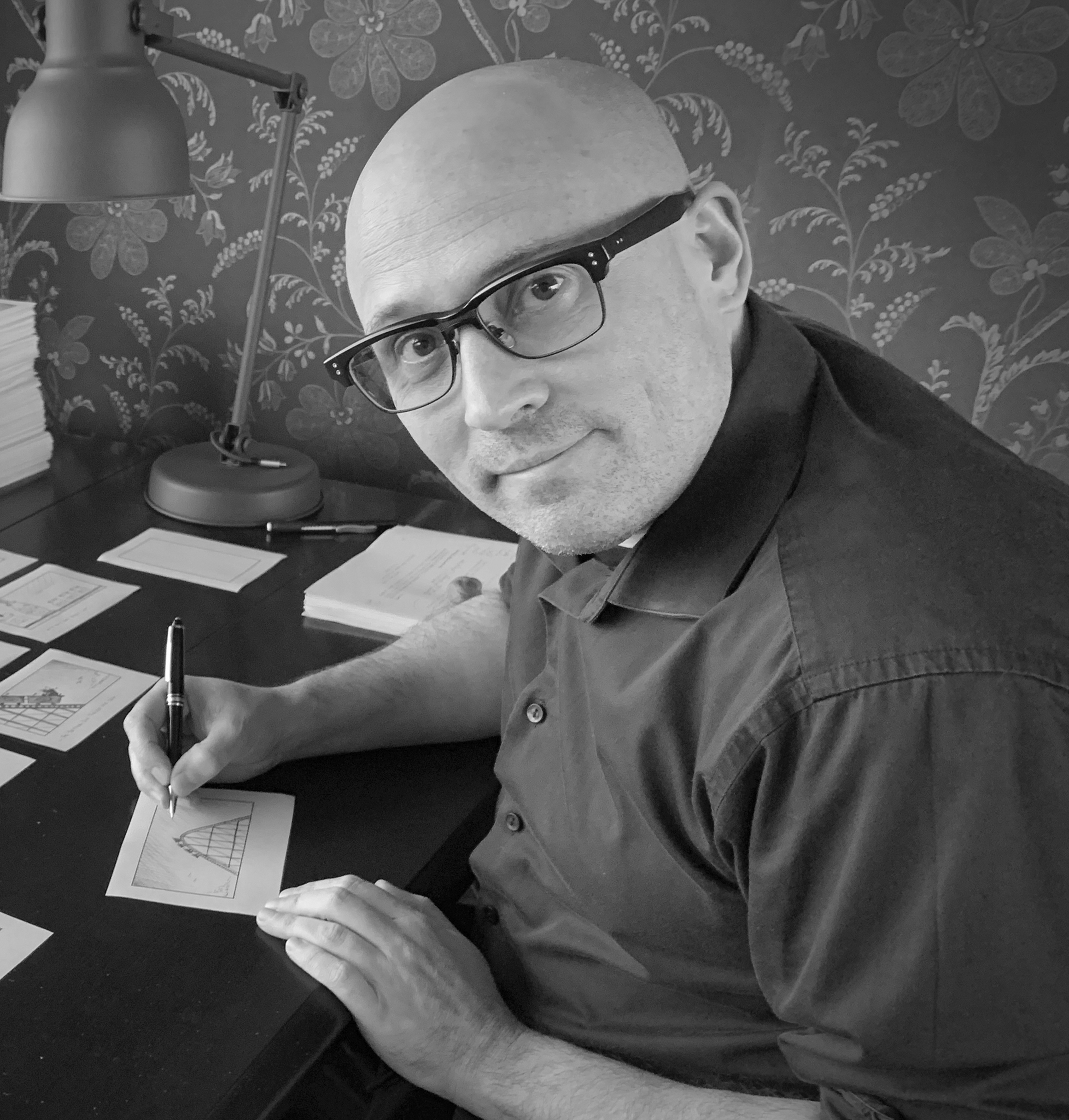 Adam Elliot with his sketches.