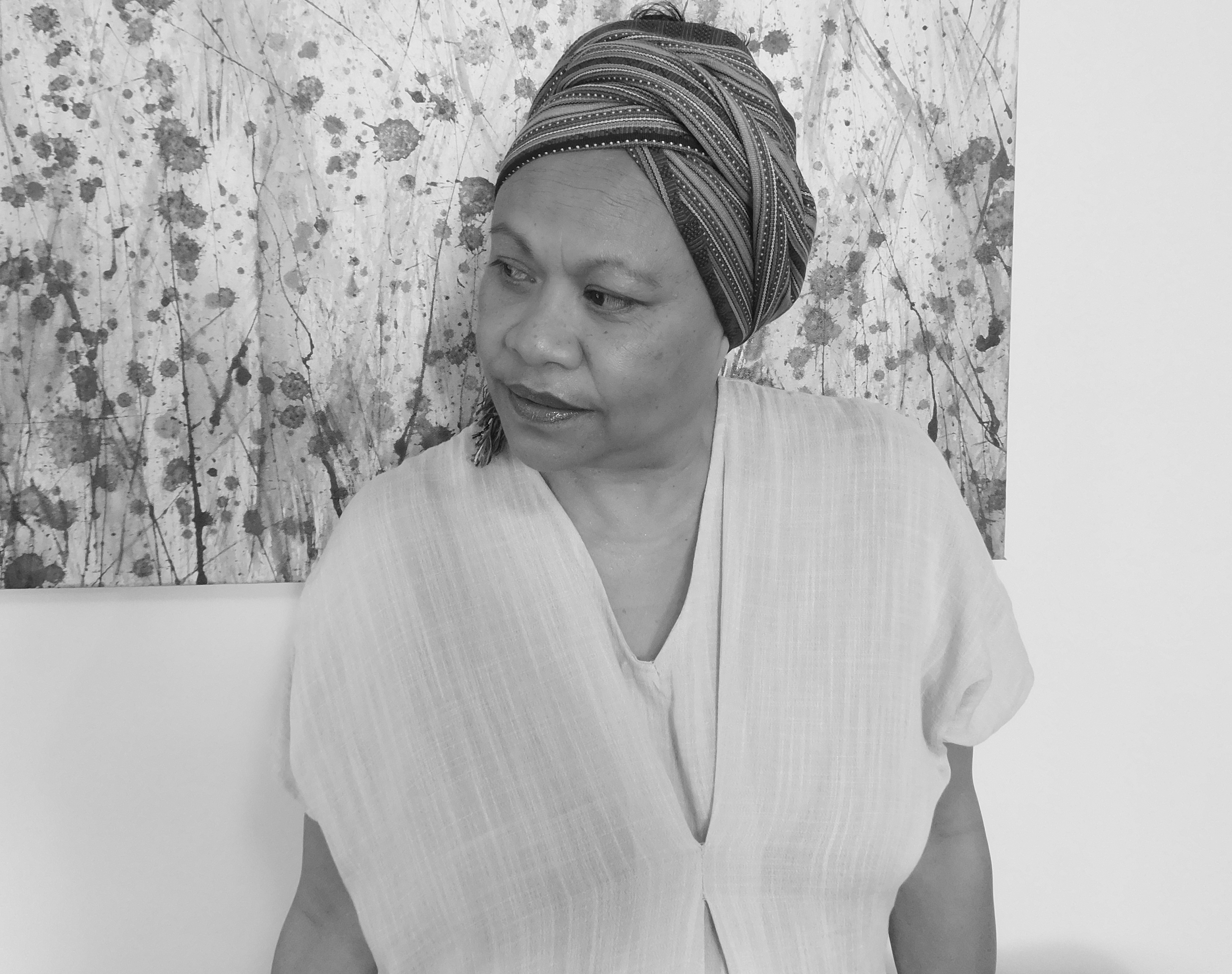 A black and white portrait photograph of Maria Madeira