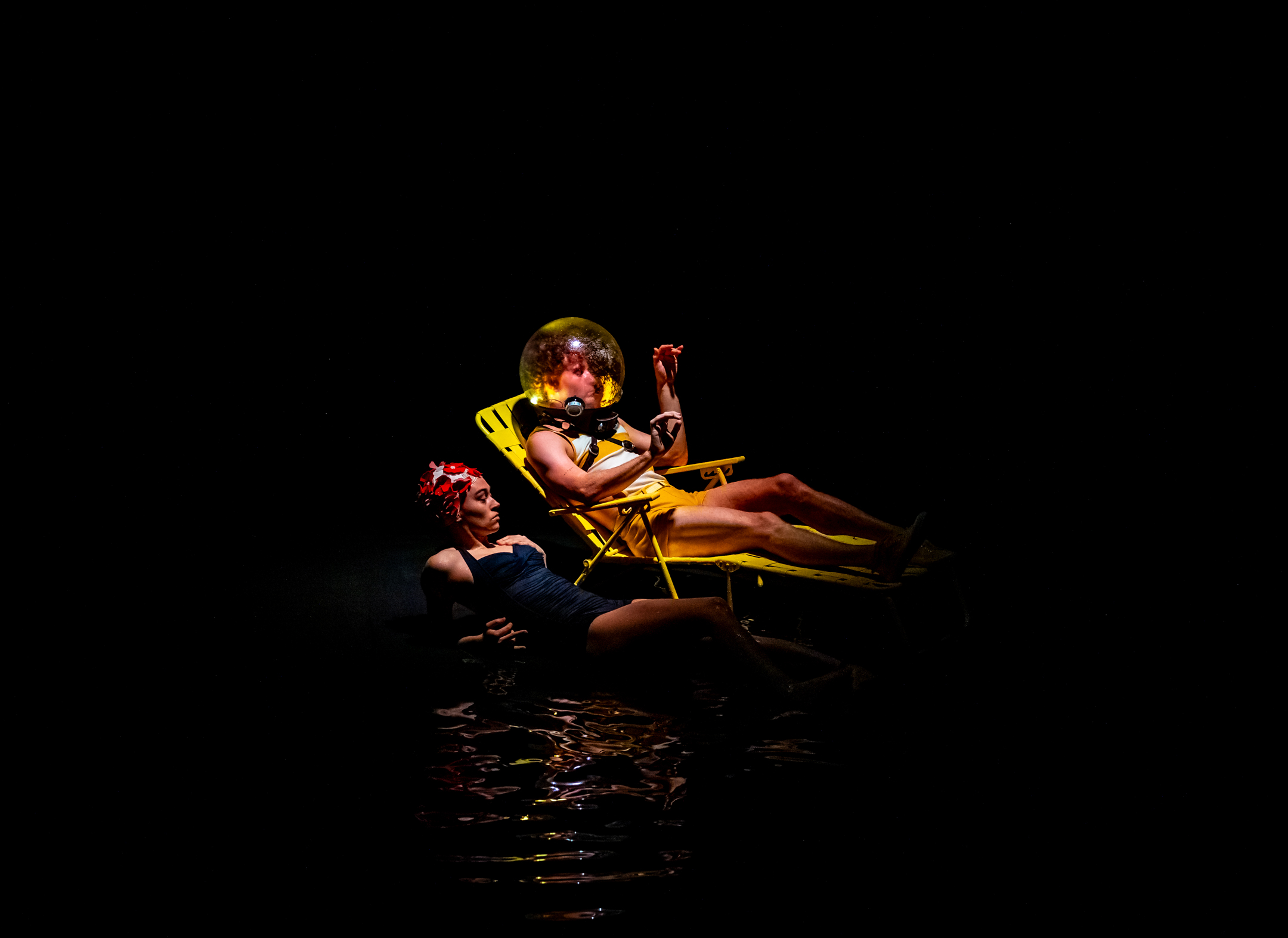 Two nightswimmers resting by the water