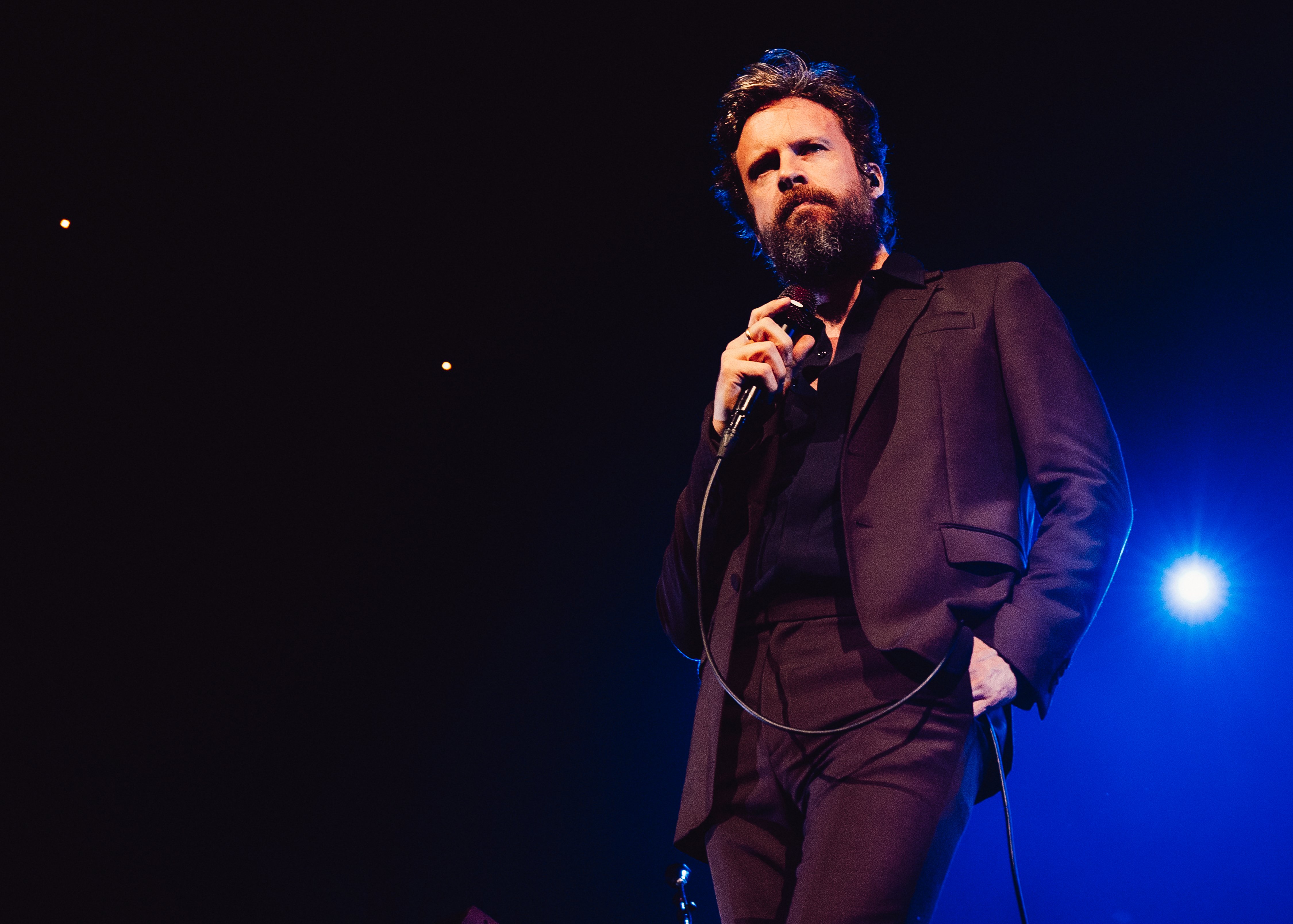 Josh Tillman on stage.