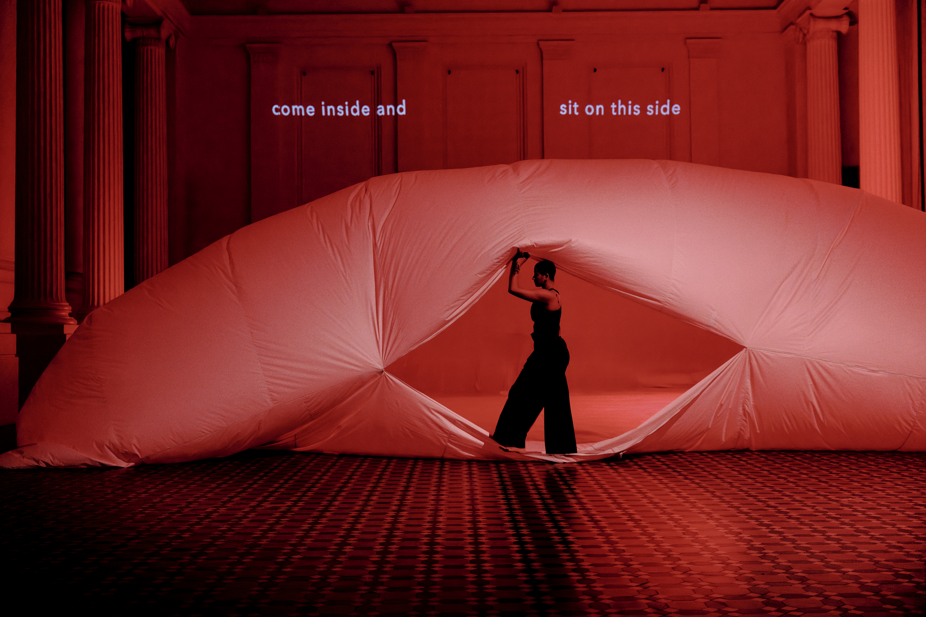 A performer with a installation.