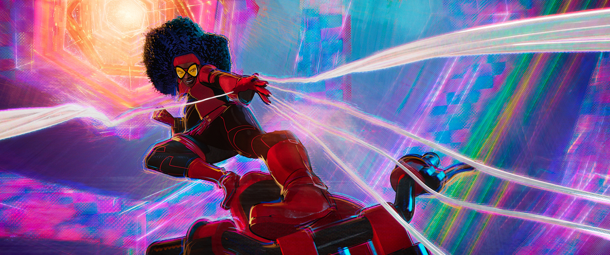 A superhero in a red outfit kicks a villain.