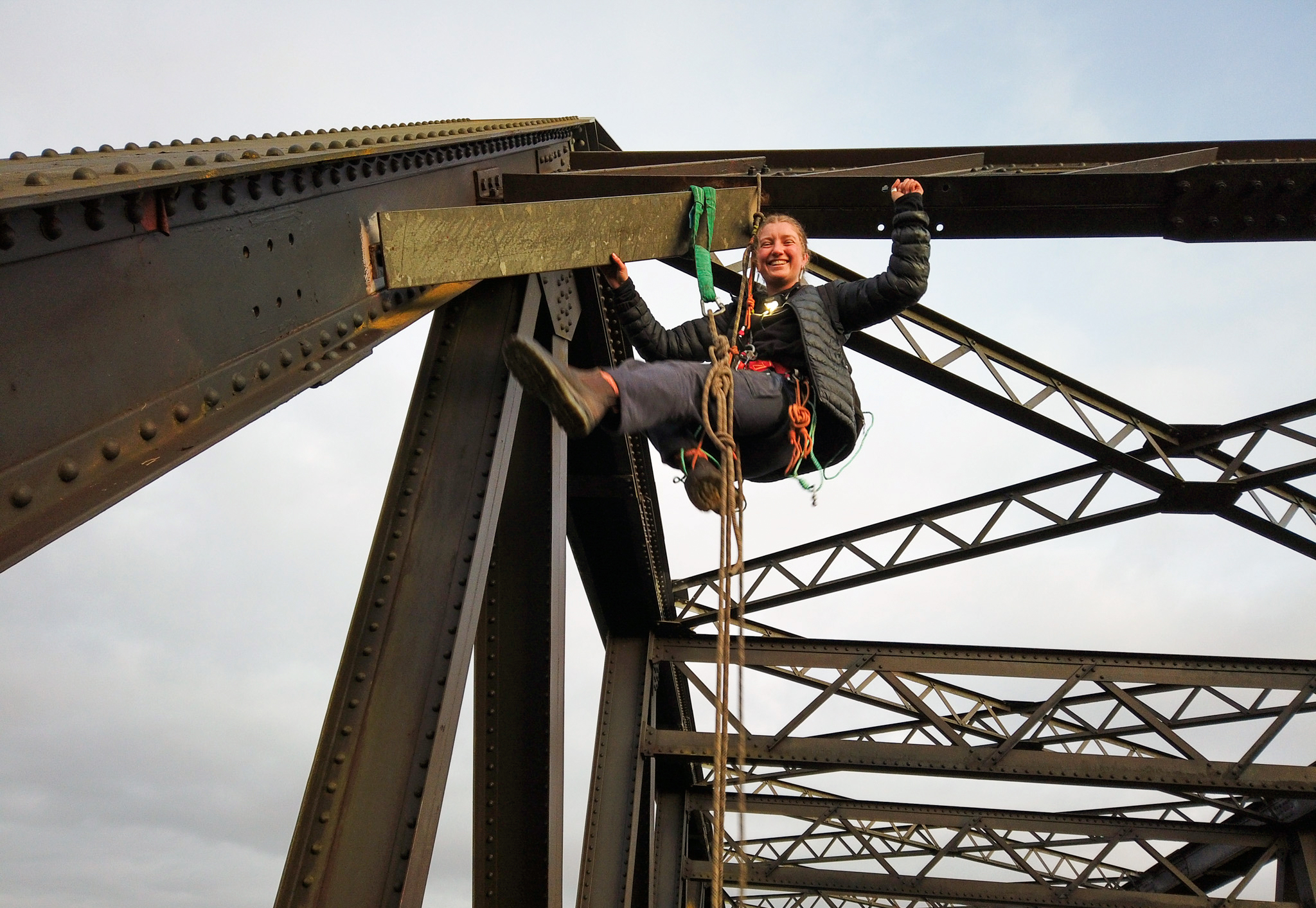Katta O’Donnell protests at the Glennies Creek rail bridge, Newcastle, on July 5, 2024.