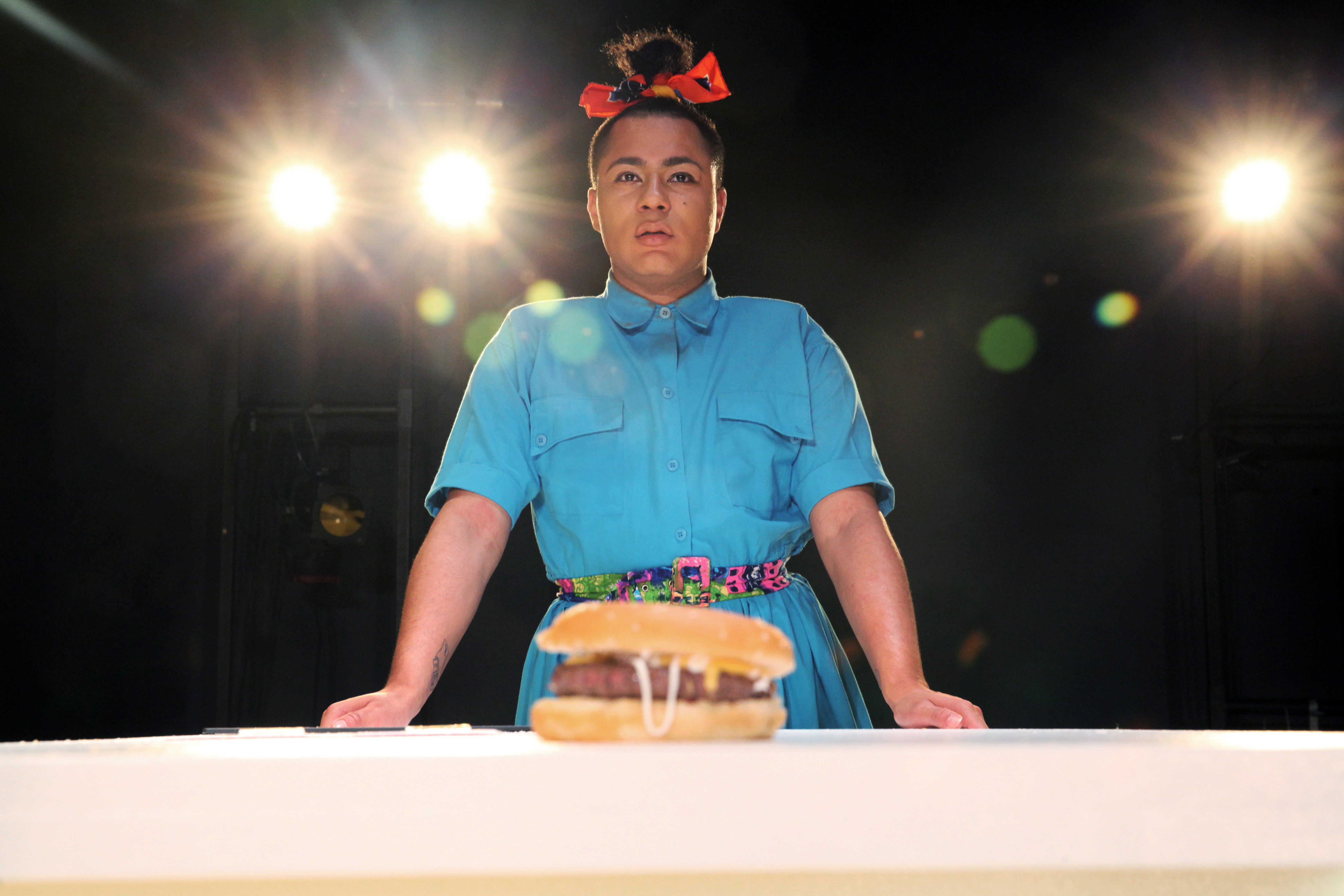 Travis Alabanza performing Burgerz.