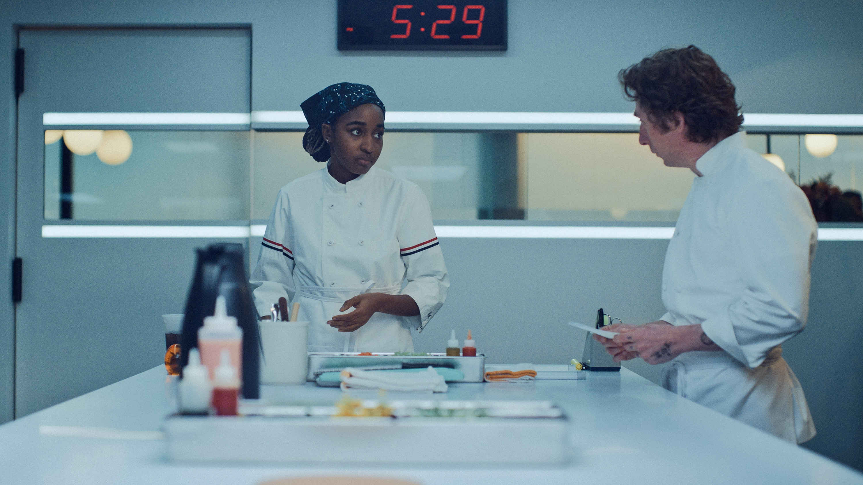 Ayo Edebiri as Sydney Adamu and Jeremy Allen White as Carmy (right) in scenes from The Bear.