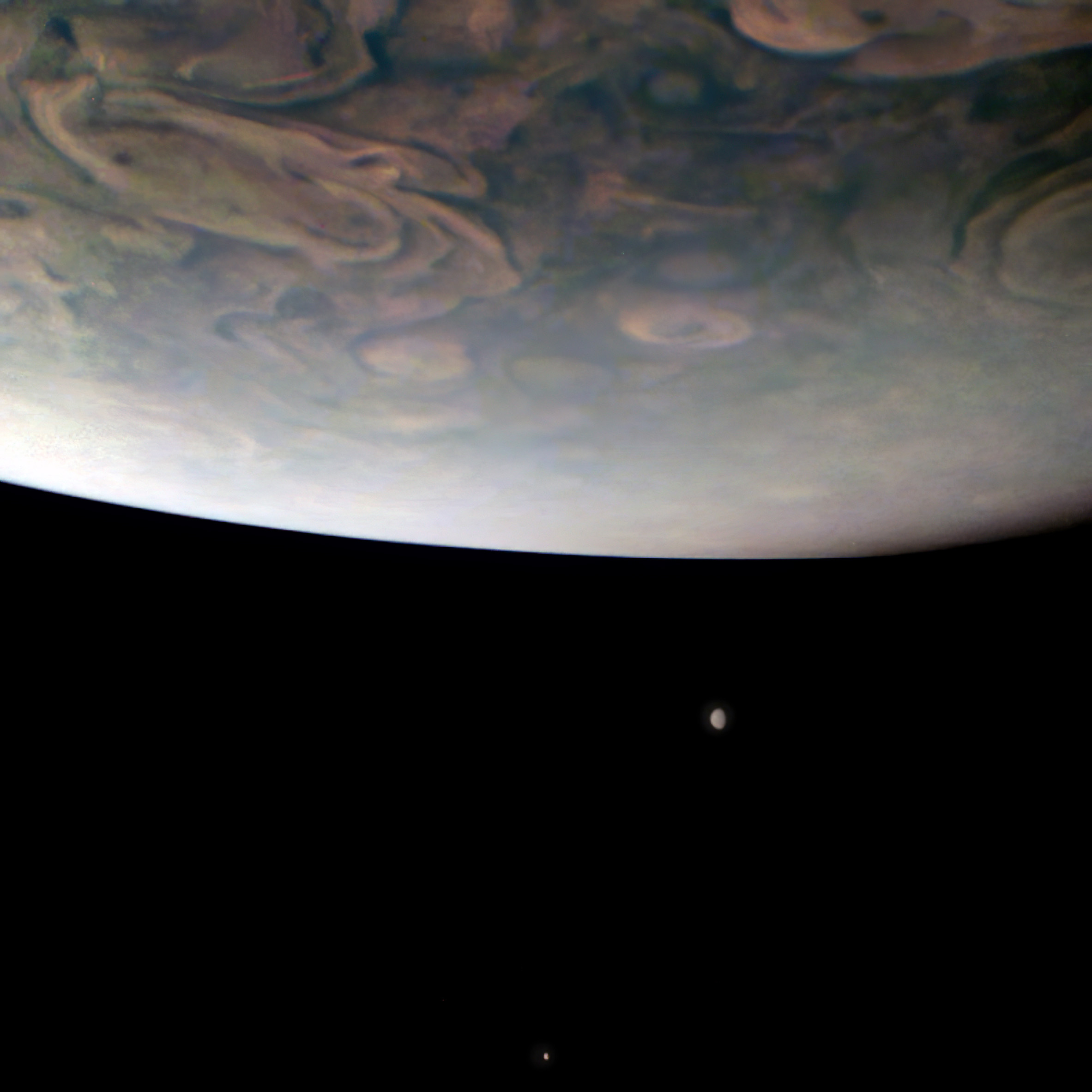 Below Jupiter’s horizon, the Io moon.