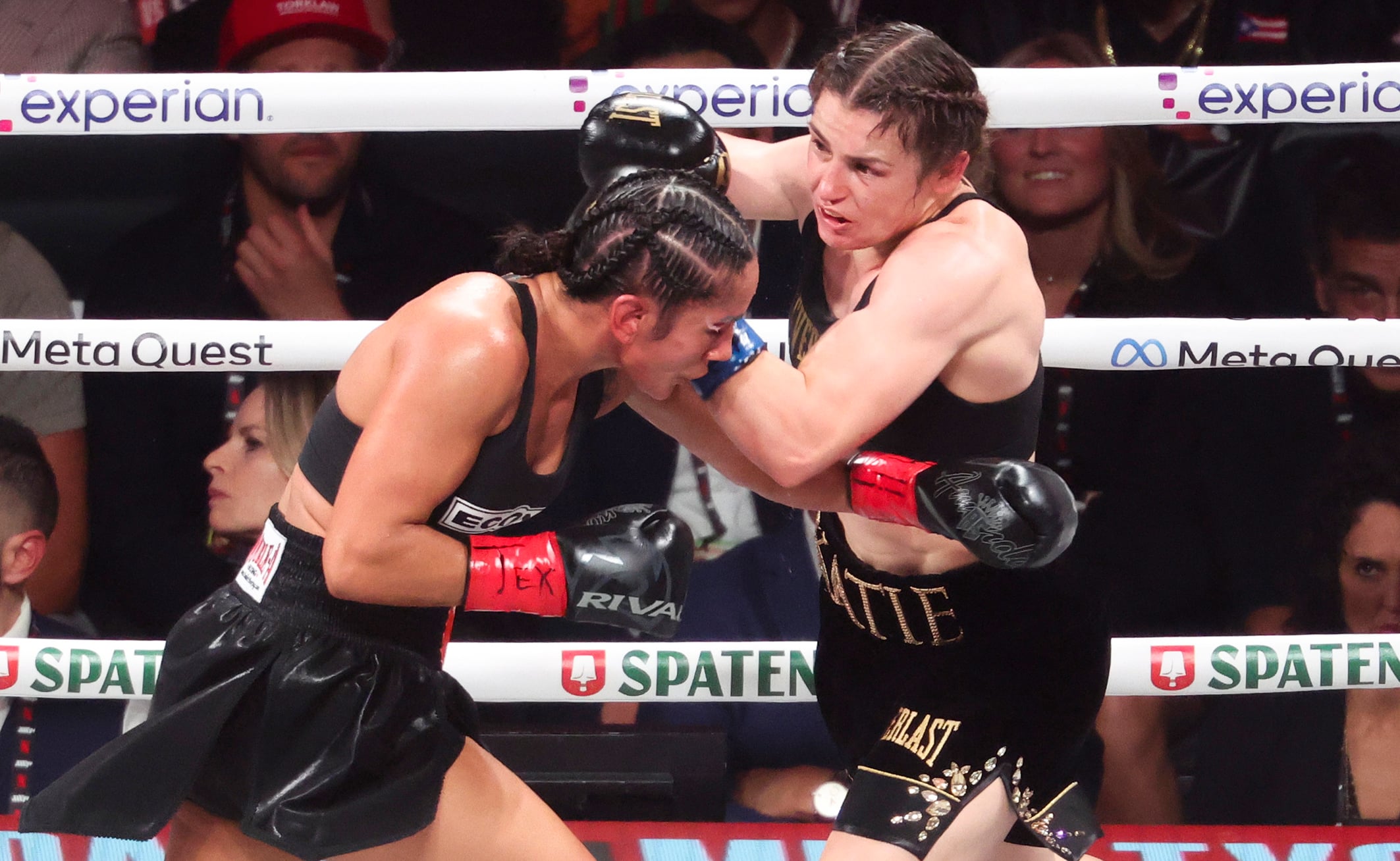 Amanda Serrano and Katie Taylor exchange blows in the ring