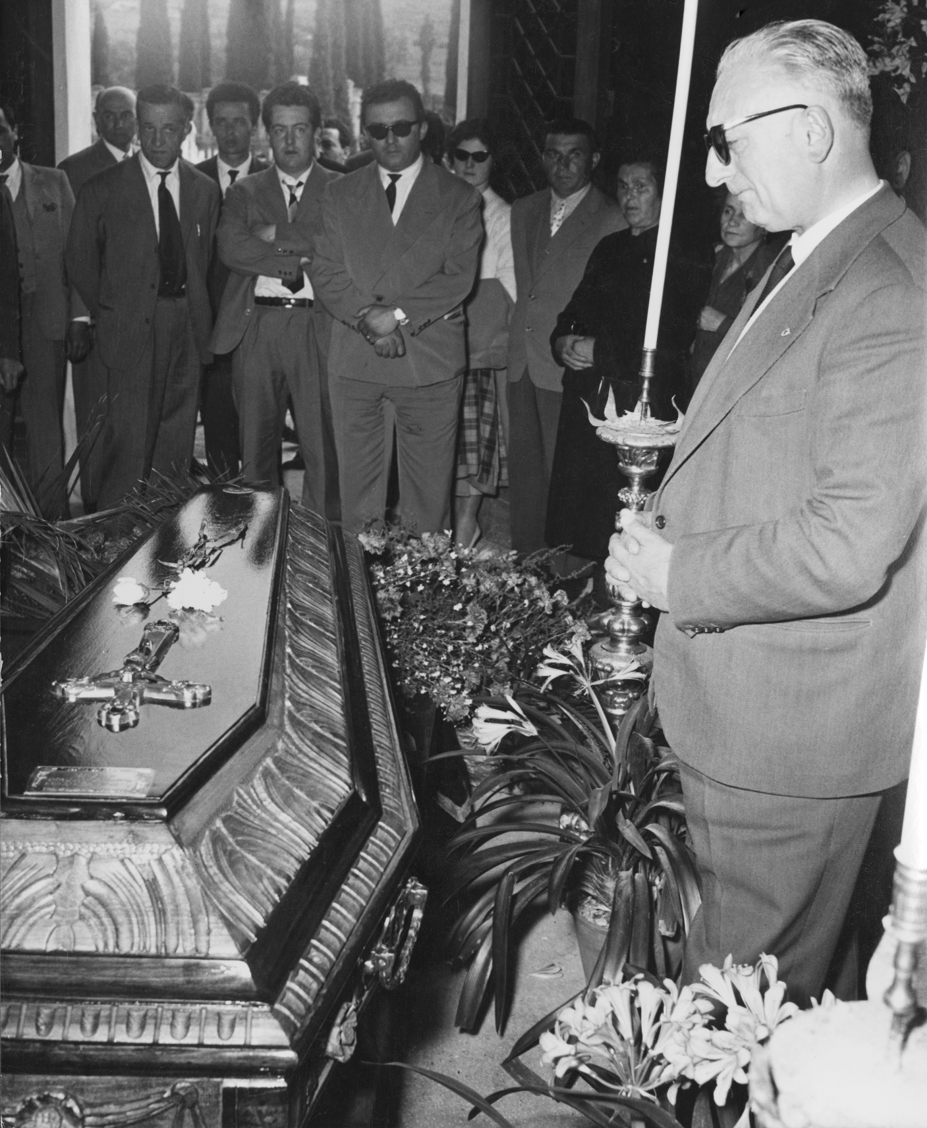 Enzo Ferrari at the funeral of driver Alfonso de Portago, in May 1957. 