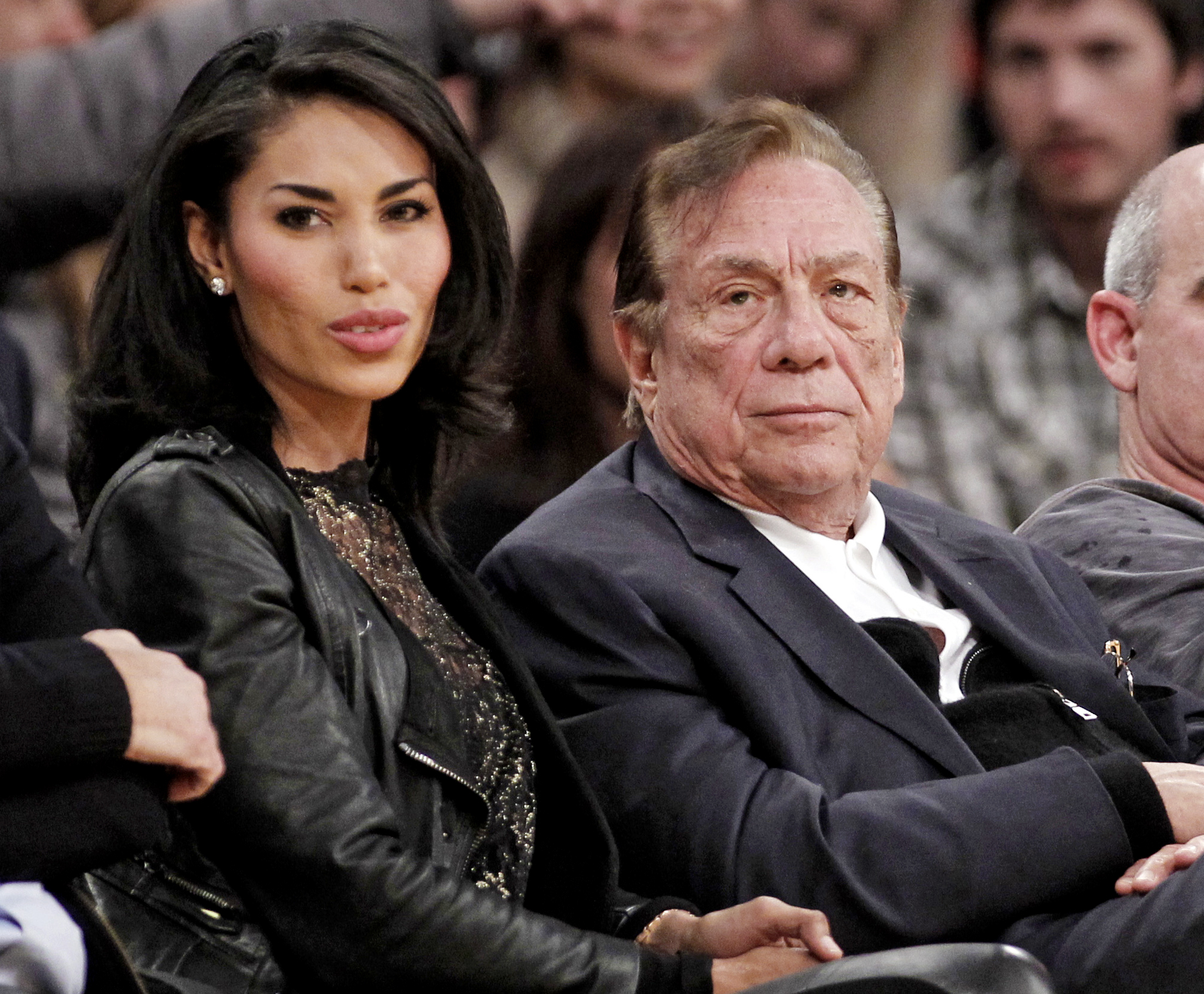 Donald Sterling, right, with V. Stiviano at a Clippers game in Los Angeles in 2011.