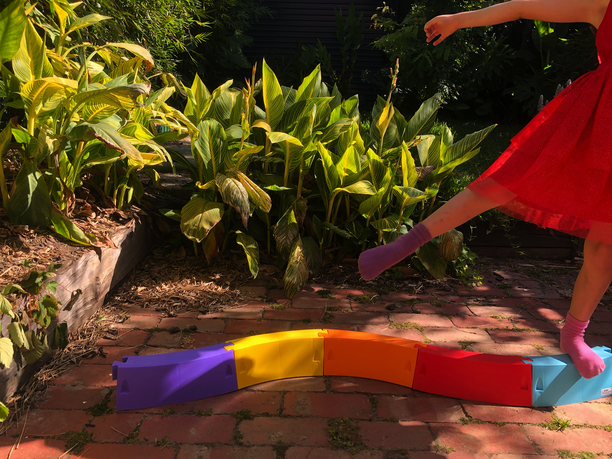 A young girl practises gymnastics.