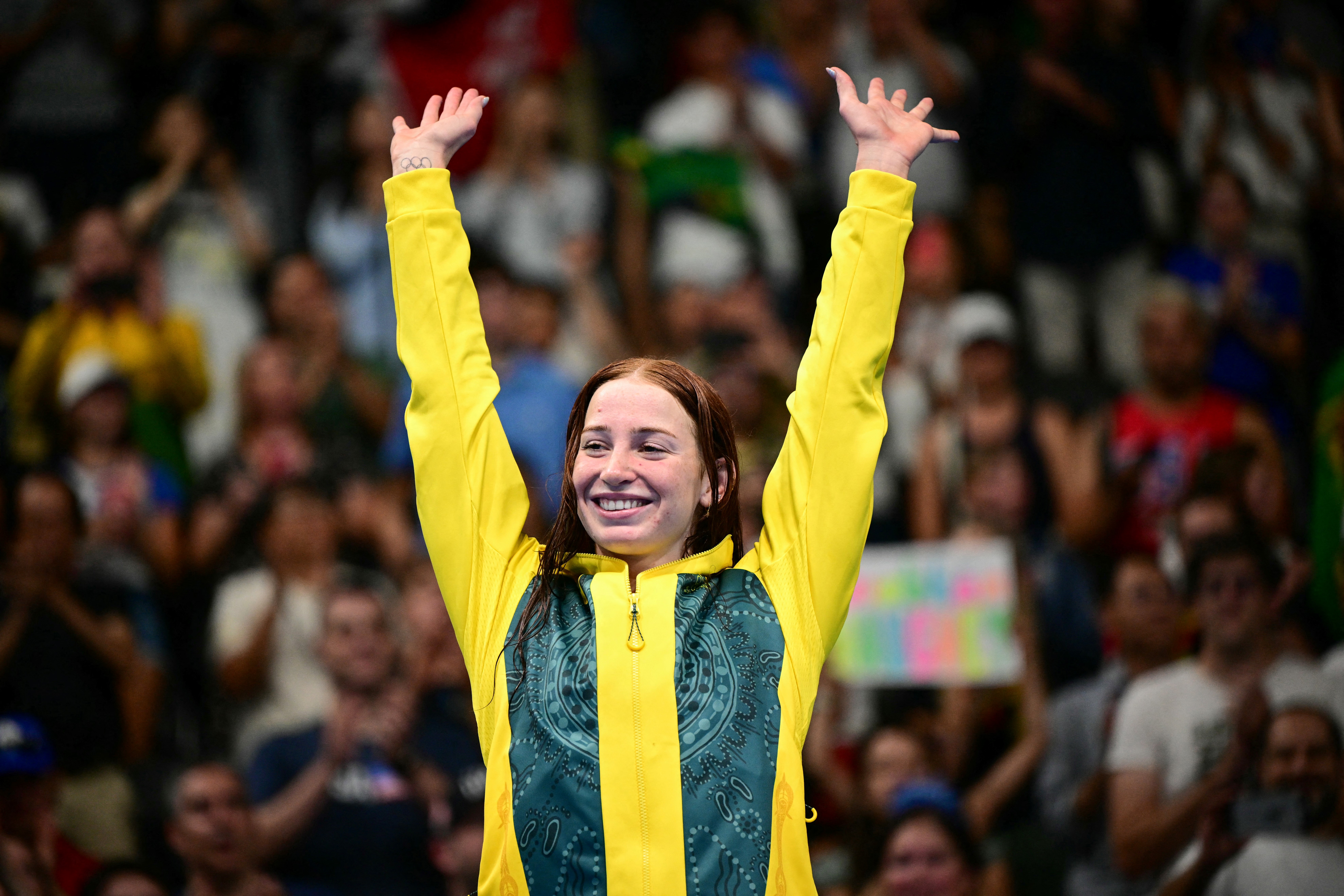 Australian Mollie O’Callaghan celebrates winning the women’s 200-metres freestyle. 