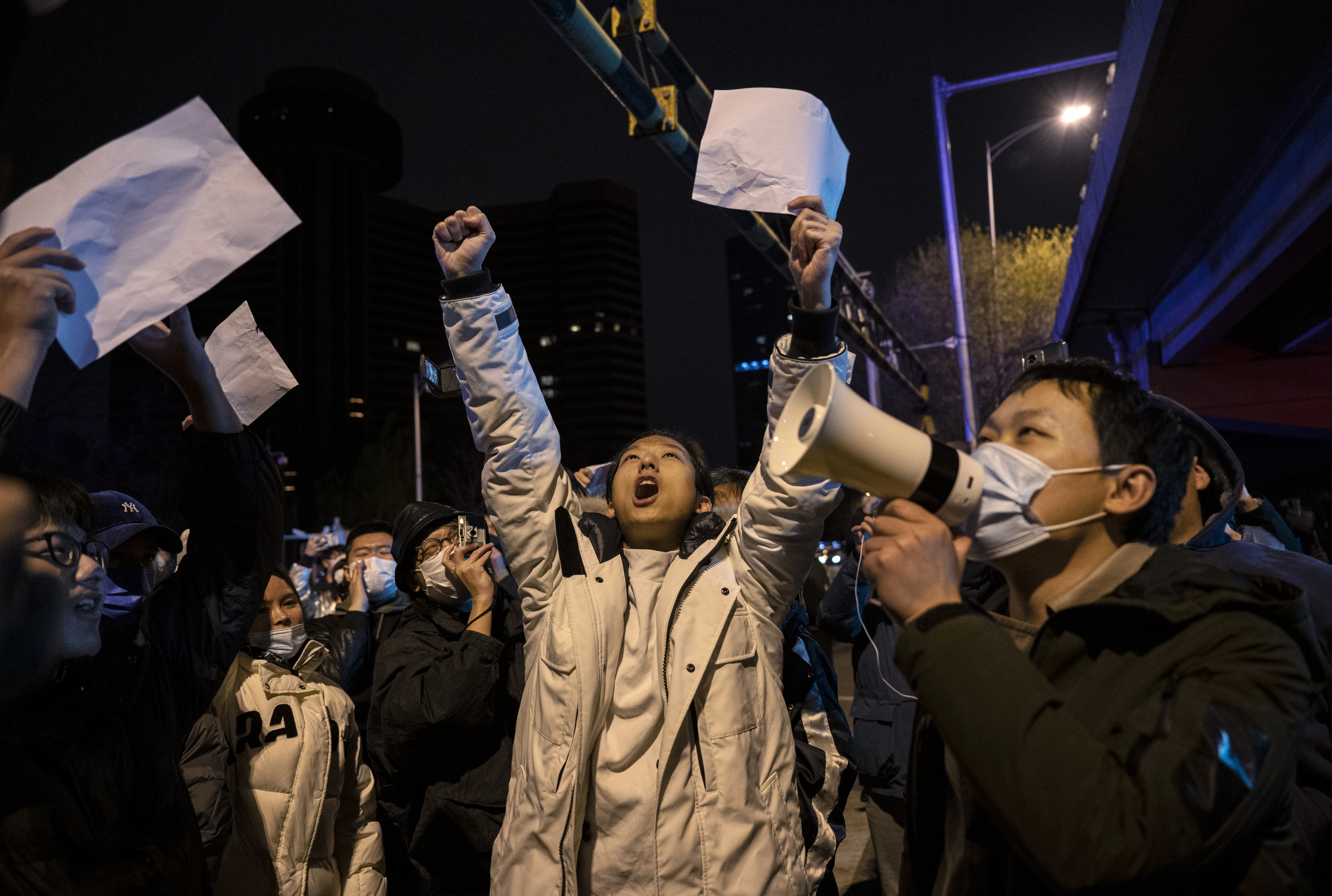 China begins easing Covid policies as unrest spreads
