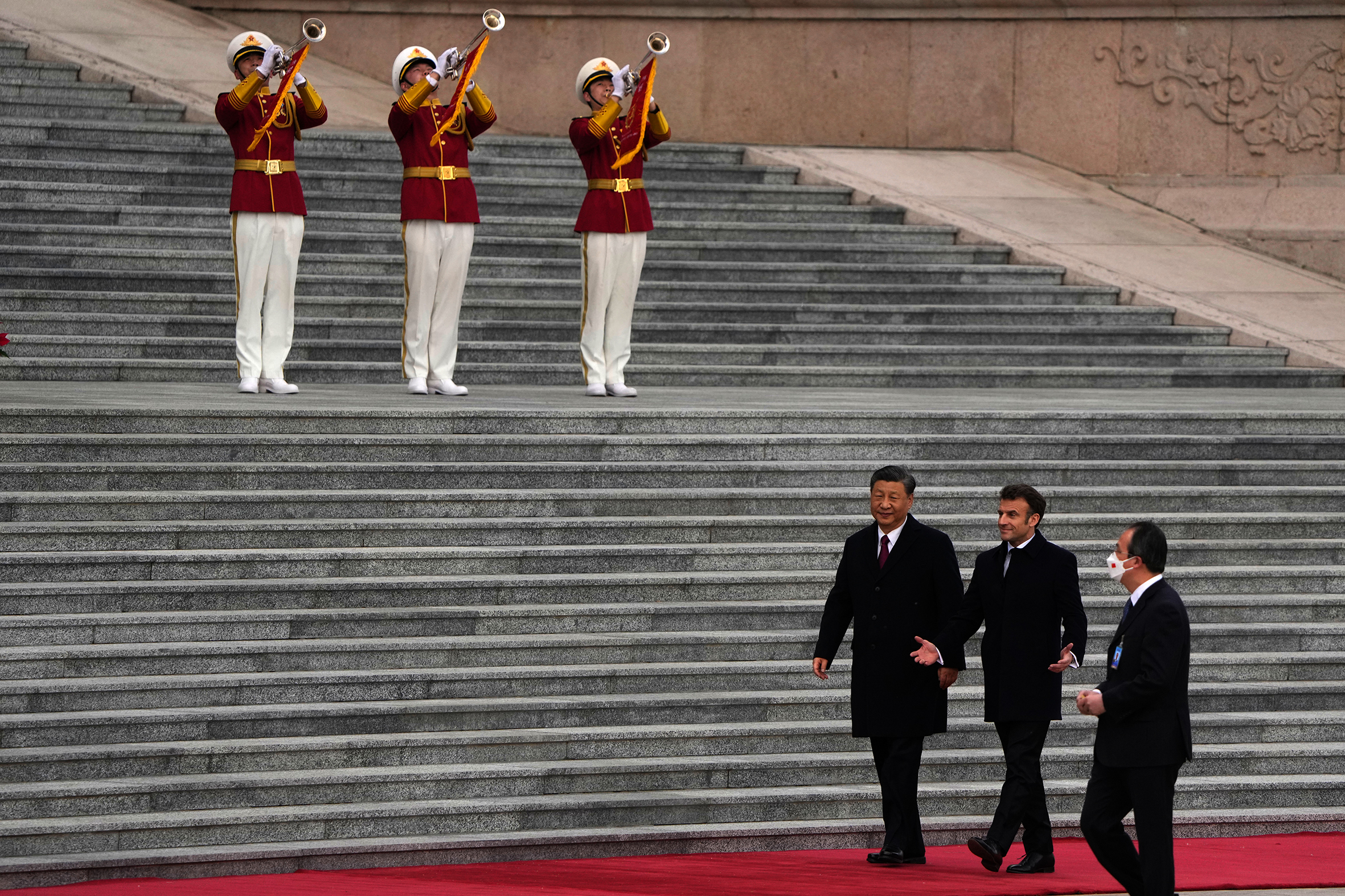 China’s President Xi Jinping and his French counterpart, Emmanuel Macron, attend the official welcoming ceremony in Beijing.
