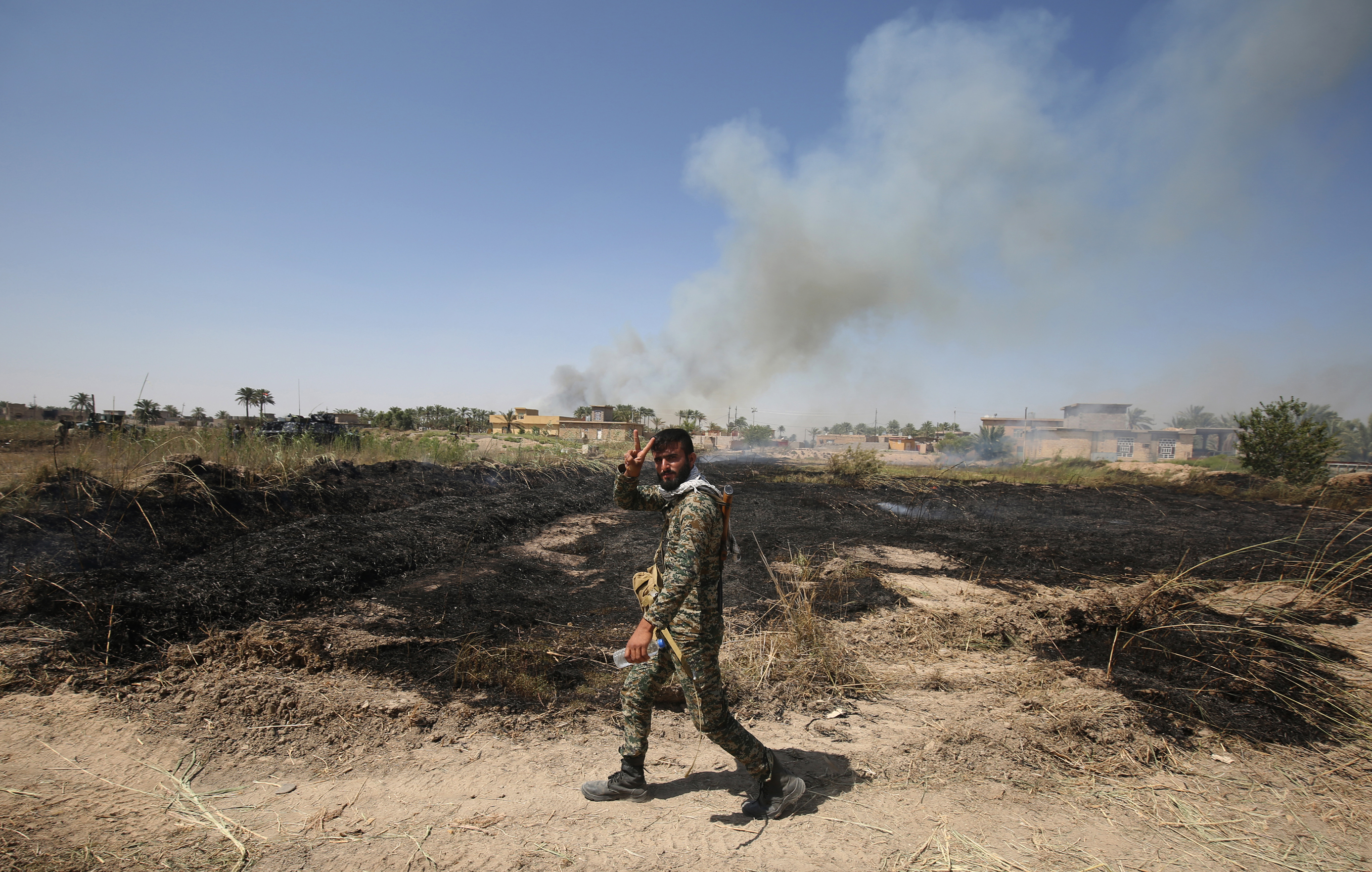 Strange bedfellows in battle for Fallujah