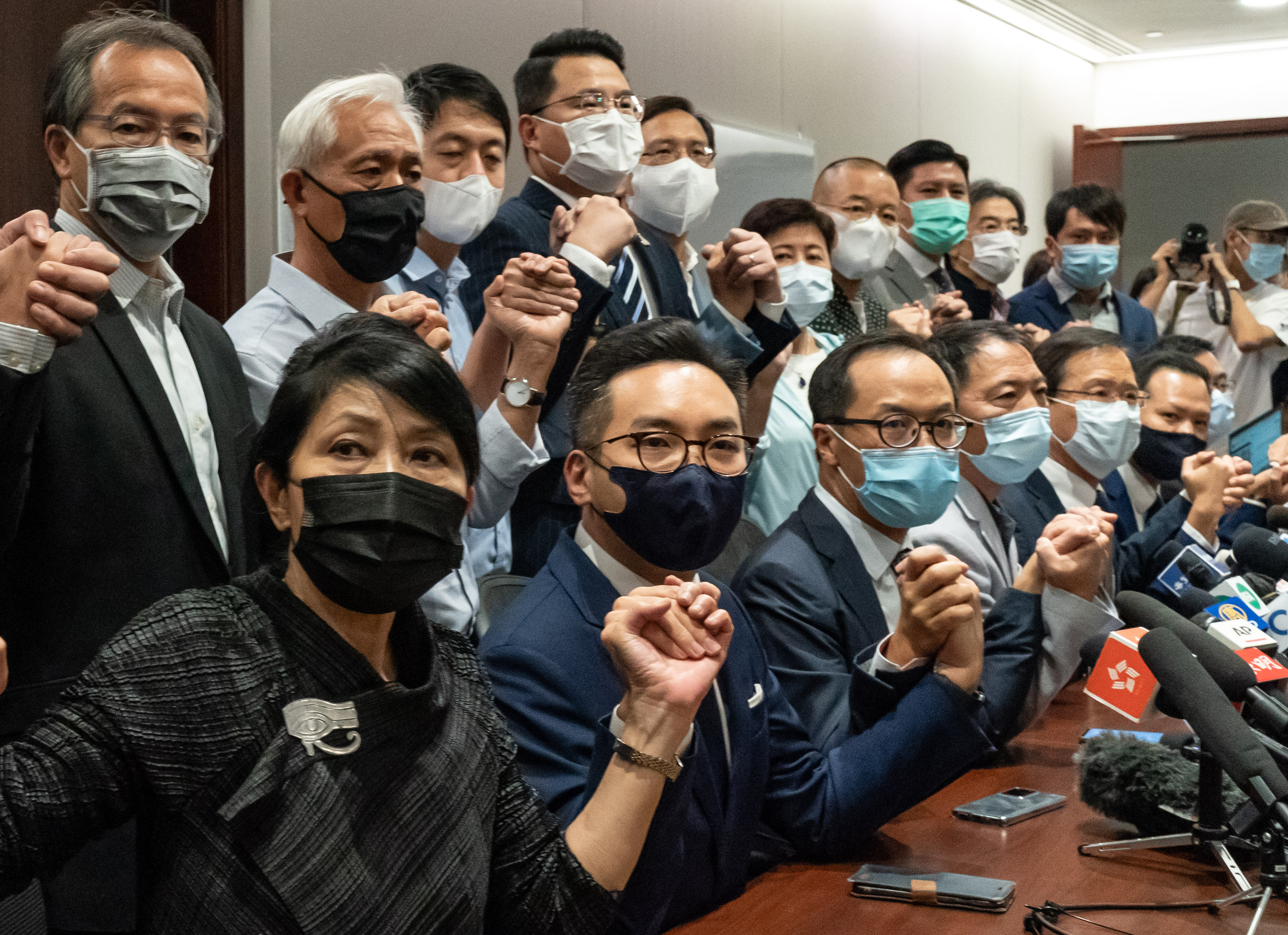 Pro-democracy opposition quits in protest in Hong Kong