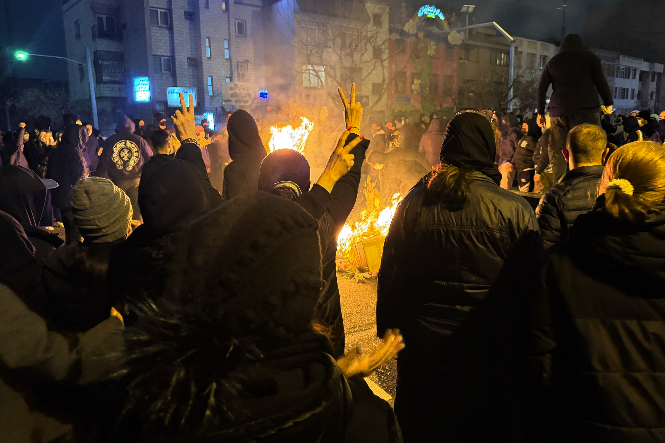Iranians gather on the streets of Tehran.