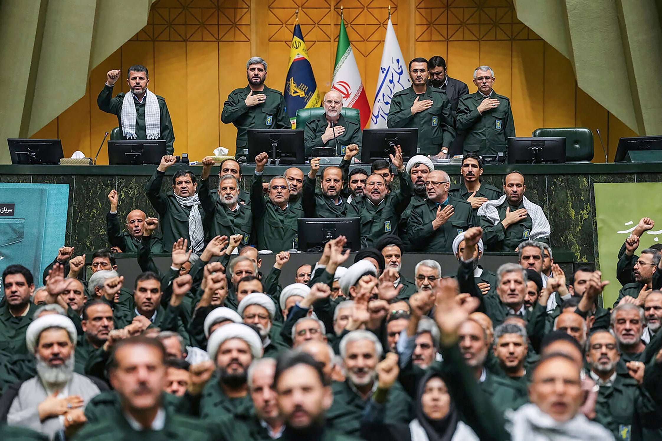 Members of Iran’s parliament dressed in Islamic Revolutionary Guard Corps.